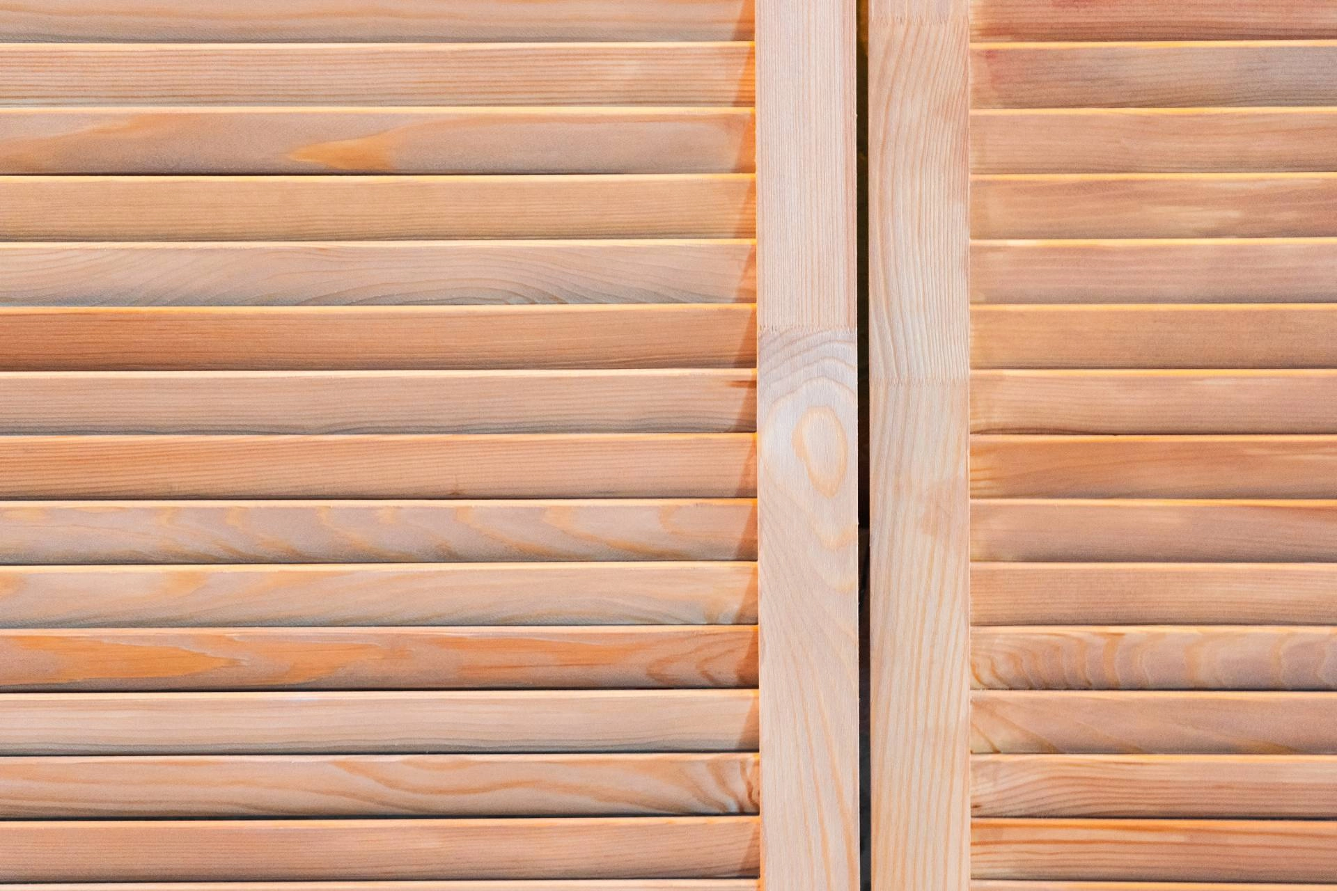 A close-up of wood interior shutters on a window near Barrington, Illinois (IL)
