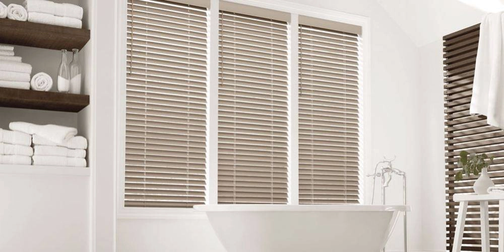Everwood® Faux Wood Blinds are bathroom-friendly options that resist warping or cracking.