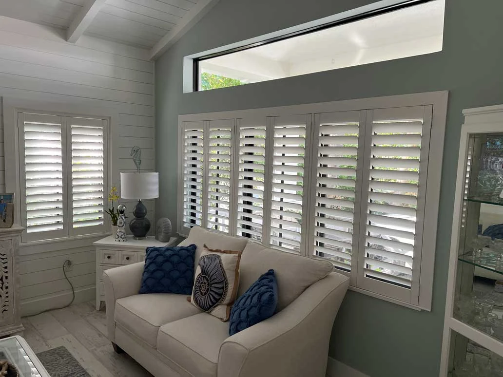 Shutters in living room windows.