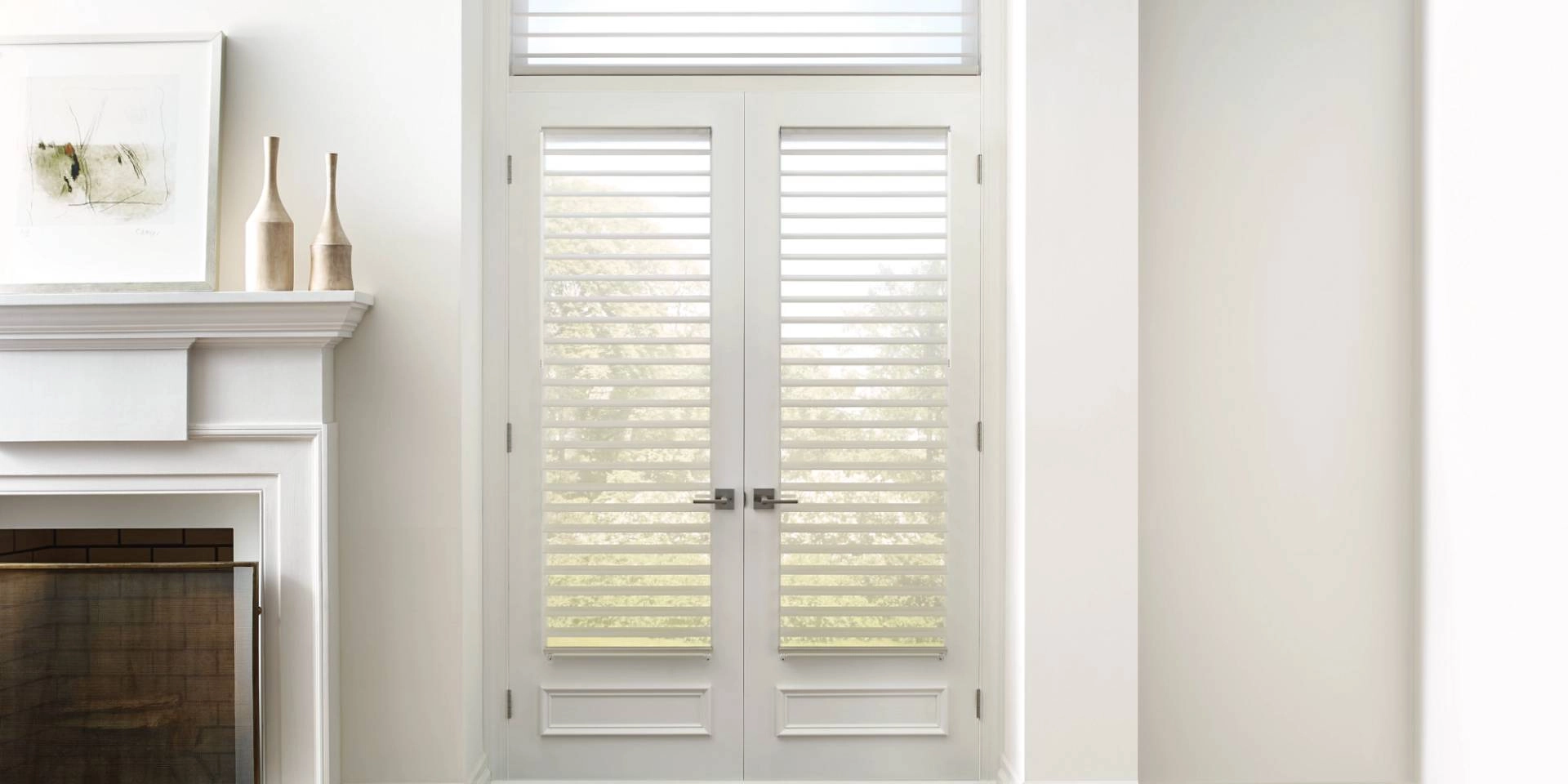 Hunter Douglas Silhouette® Sheer Shades on French doors in a bright and airy residential living room