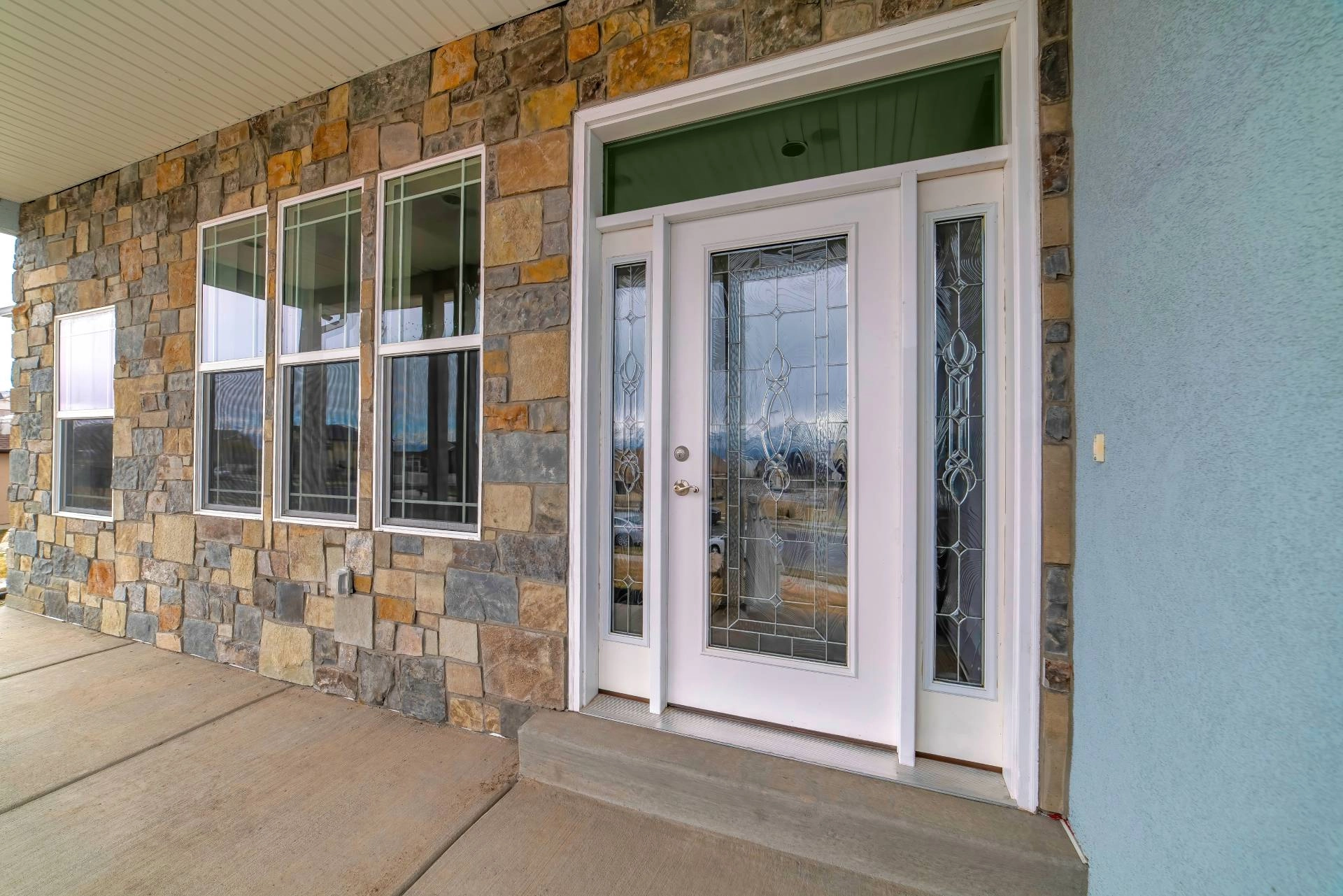 A glass door with a sidelight windows near Newhall, CA