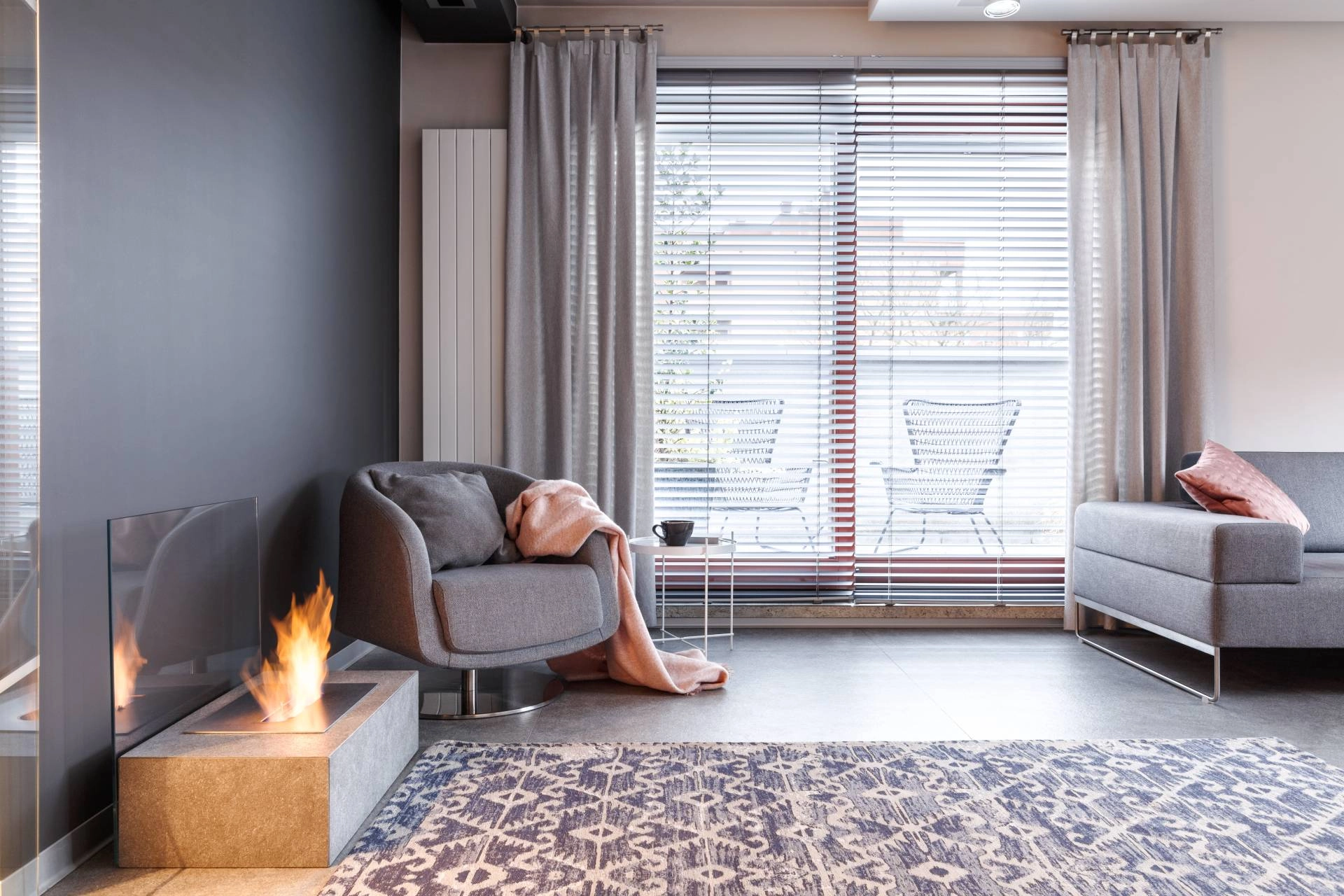 Custom drapery with blinds in a contemporary apartment