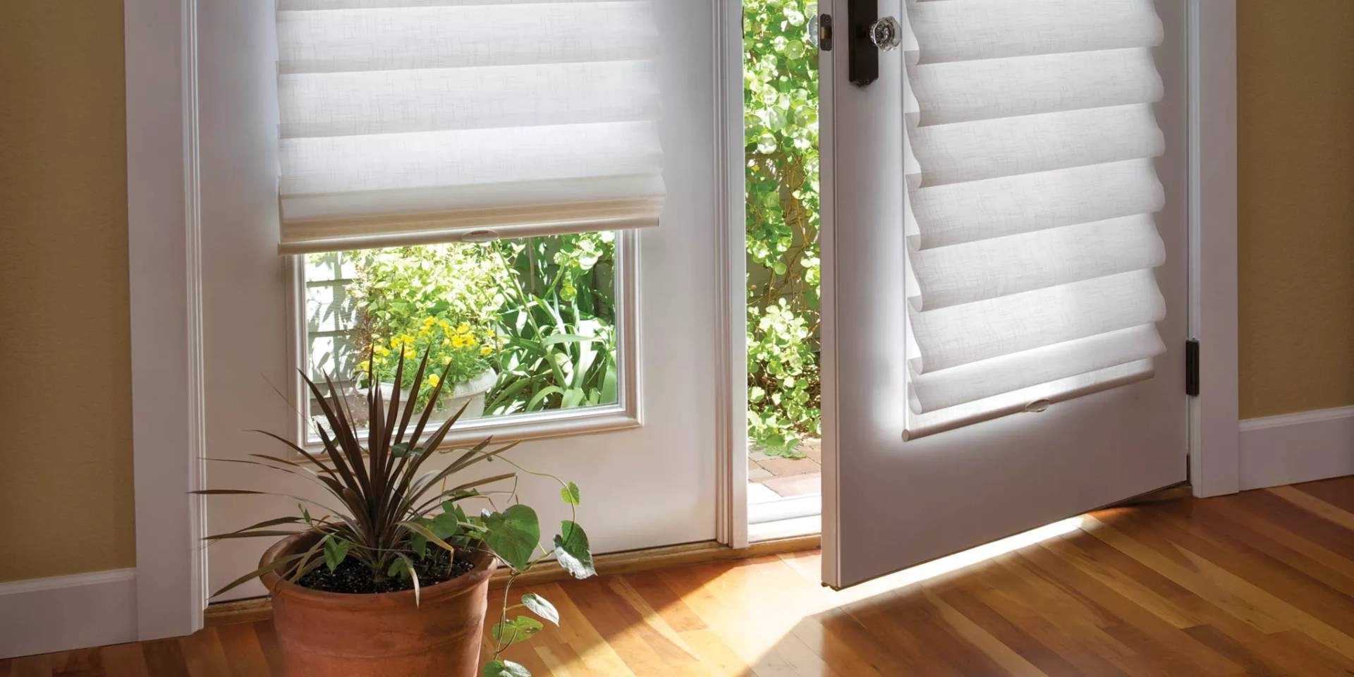 photo: 10042302-banner-getting-your-home-ready-for-summer-with-french-door-blinds-and-shades.jpg