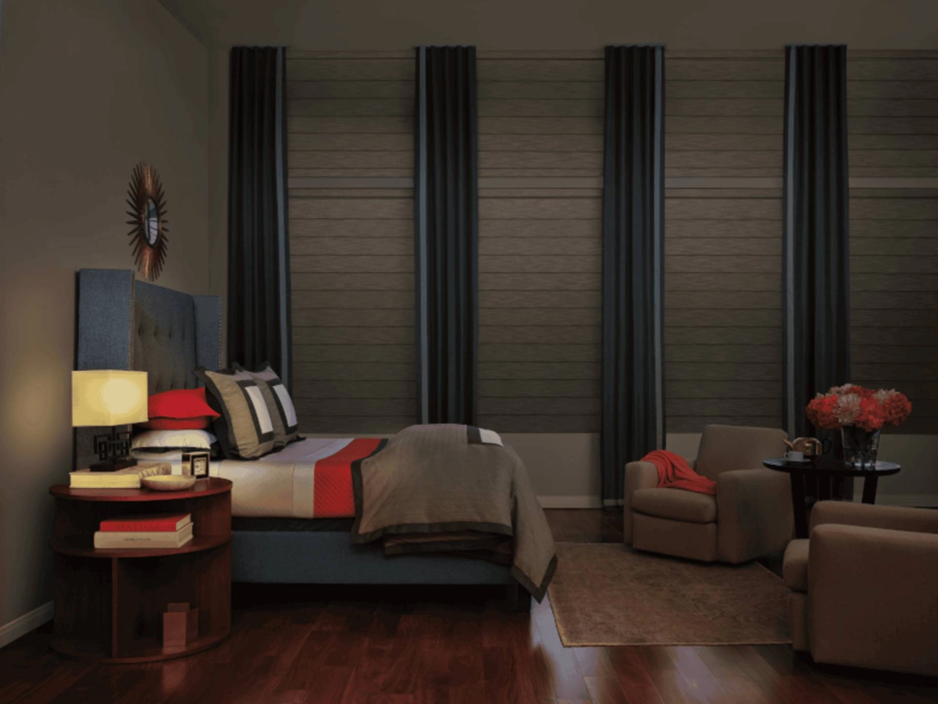 Combining drapery with Roman shades creates a dark, cozy atmosphere for summer nights.