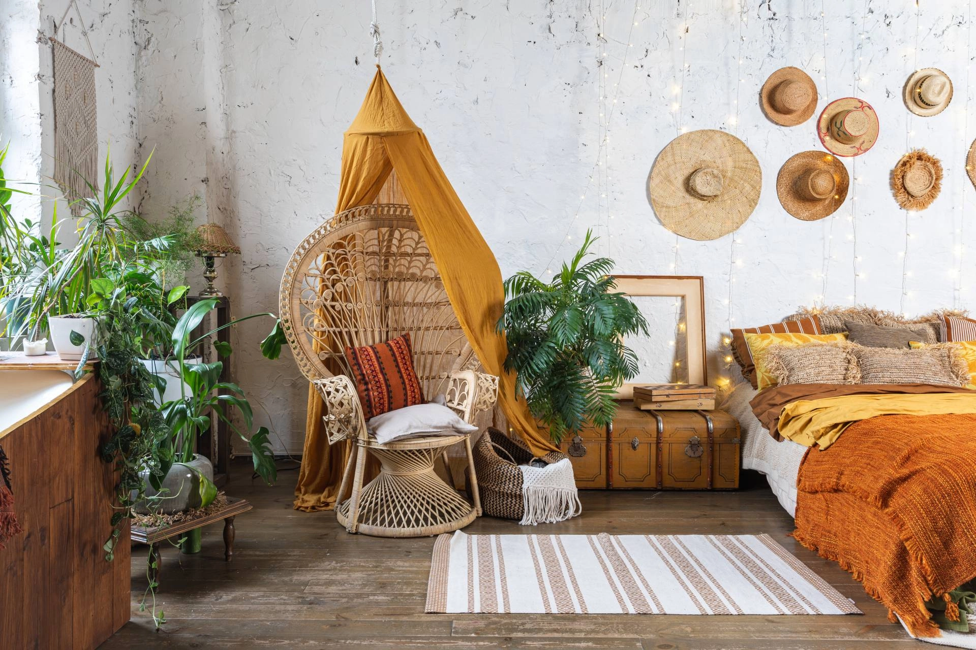 A cozy bedroom with a Bohemian interior design style near Mobile, Alabama (AL)