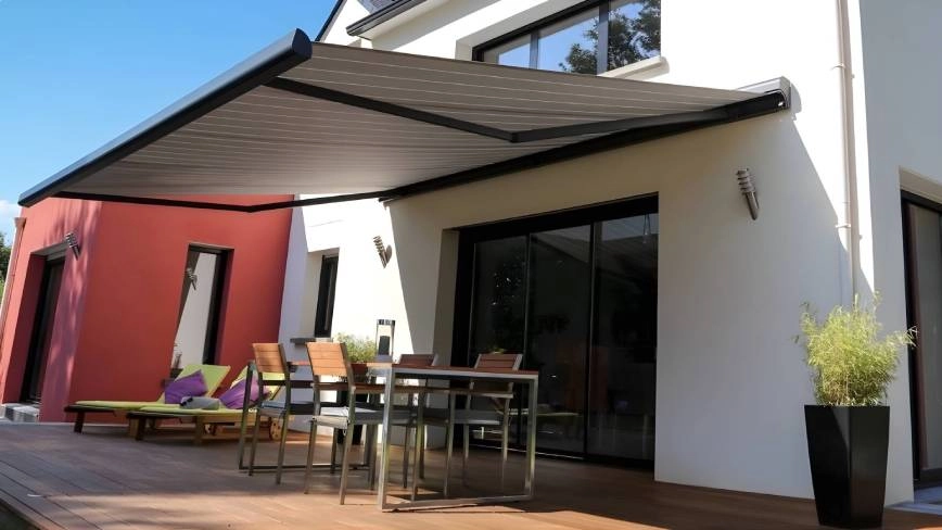 Custom awnings over a patio seating area near Bloomington, Illinois (IL)
