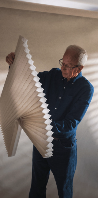 Wendell Colson Inspecting A Duette Cellular Shade - mobile