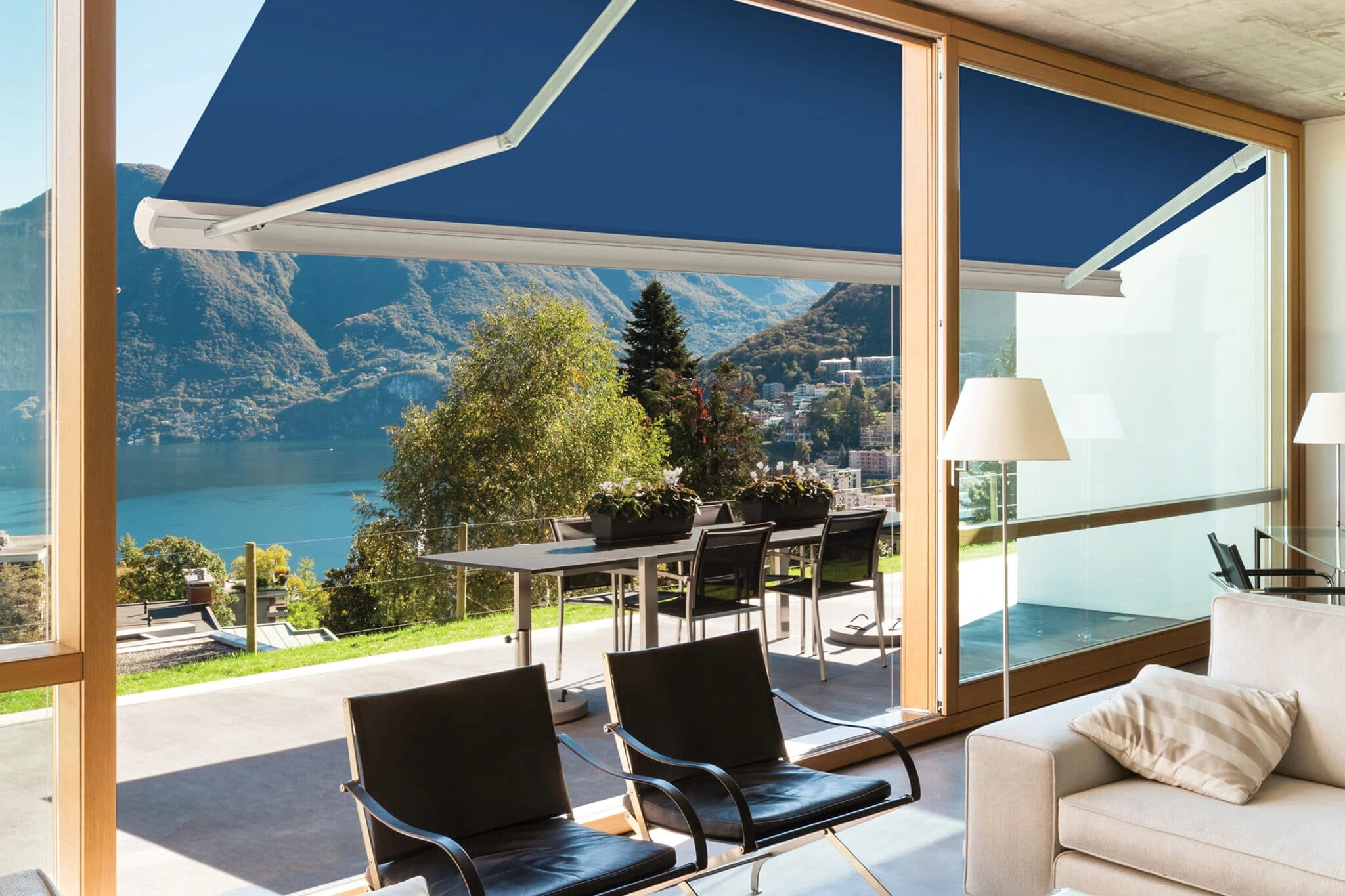 Outdoor shades, awnings, and enclosures by JM Windows.