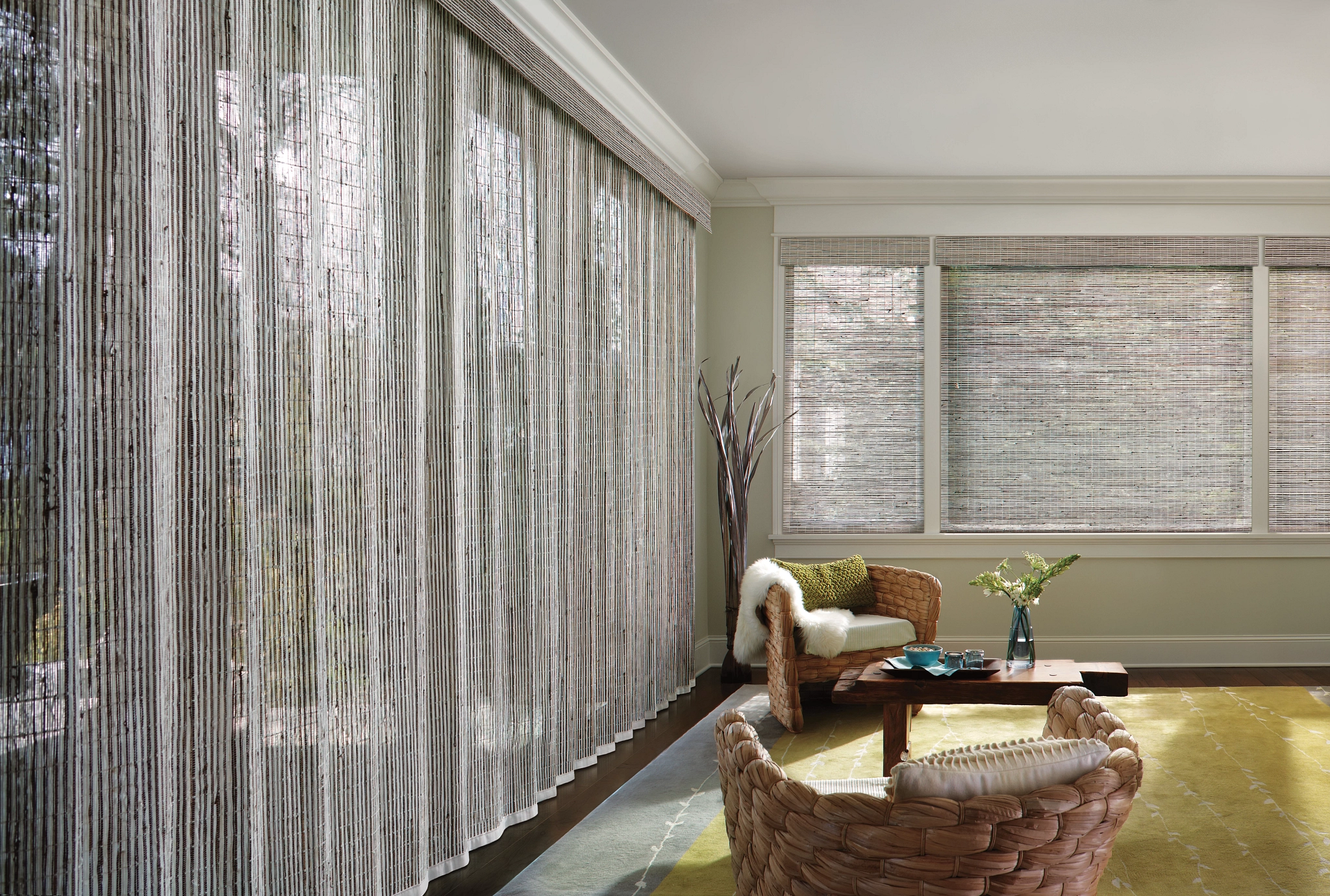 Hunter Douglas Provenance® Woven Wood Shades in a modern boho living room near Freeland, MI