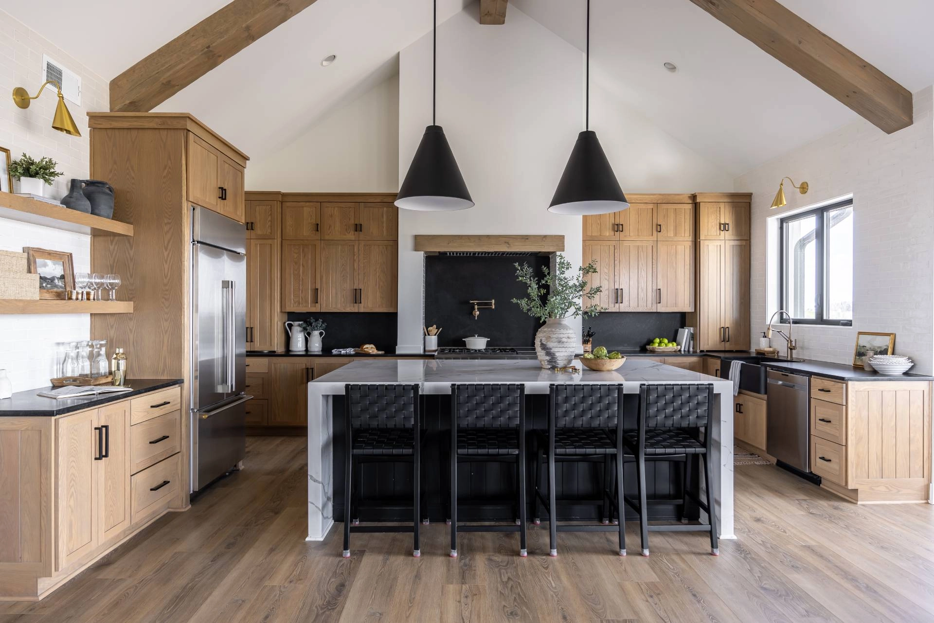 A modern kitchen with a window above the sink in need of custom window treatments