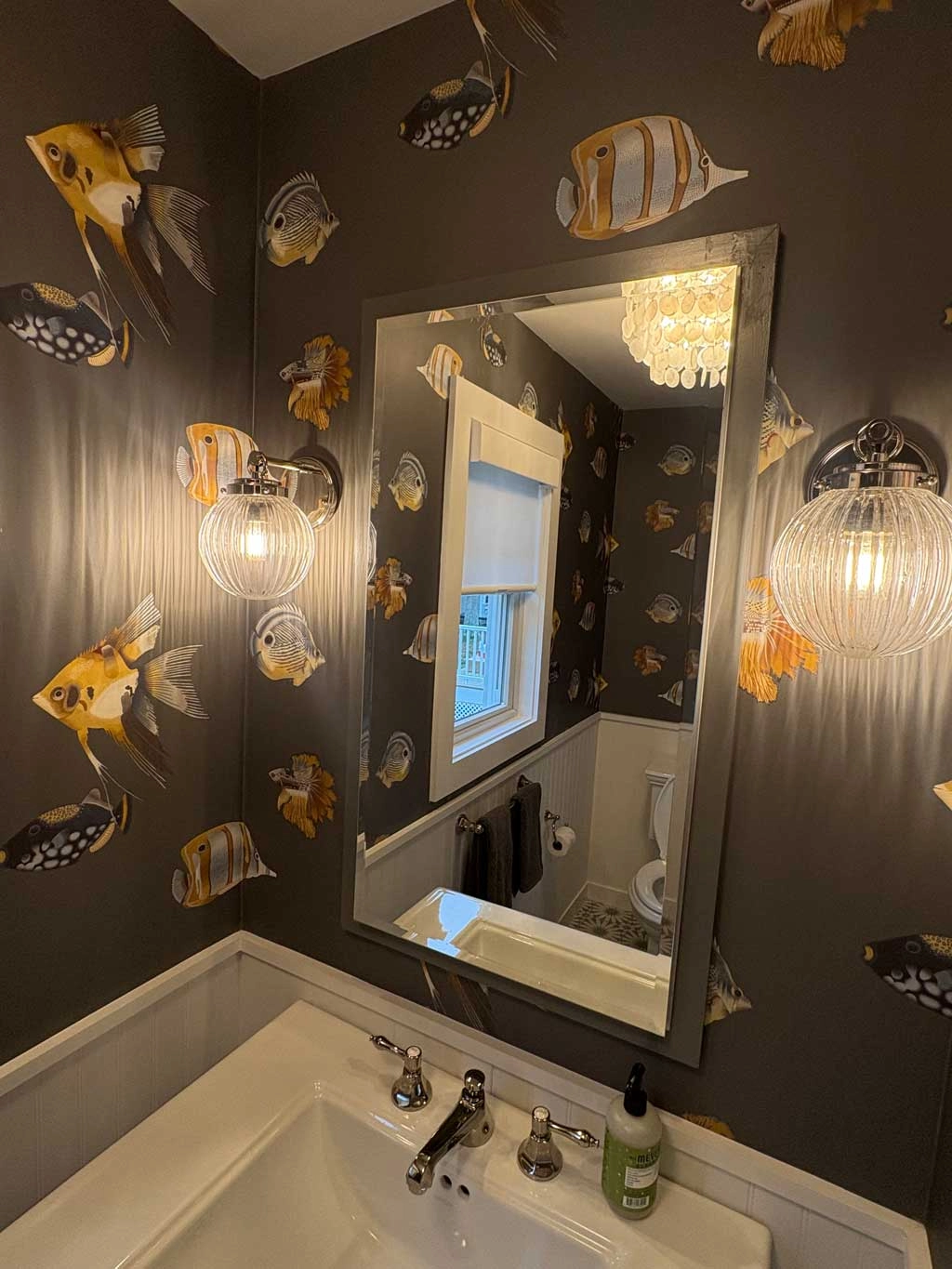 Wallpaper in a bathroom with fix on it.