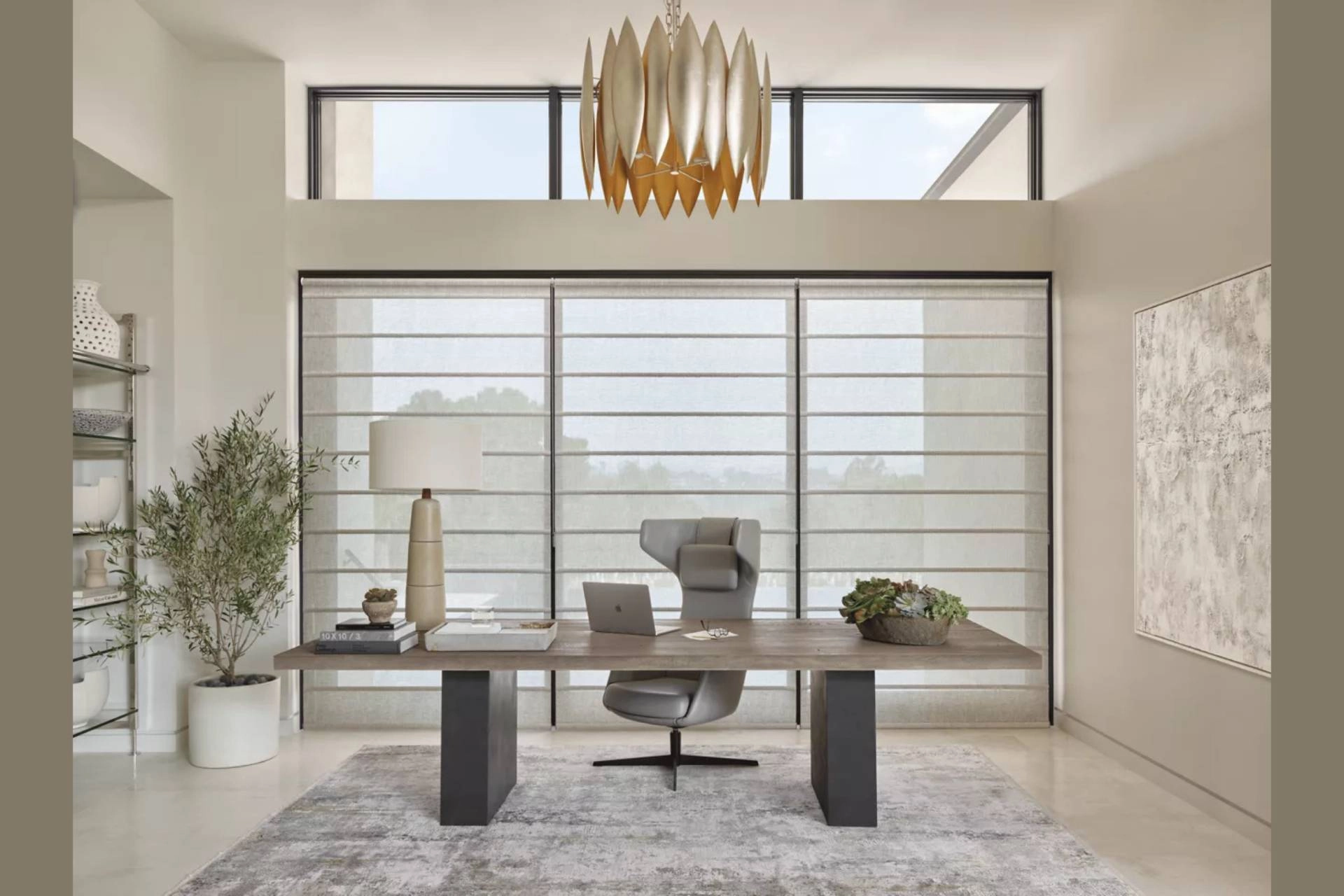 Hunter Douglas Alustra™ Roller Shades in a modern home office.