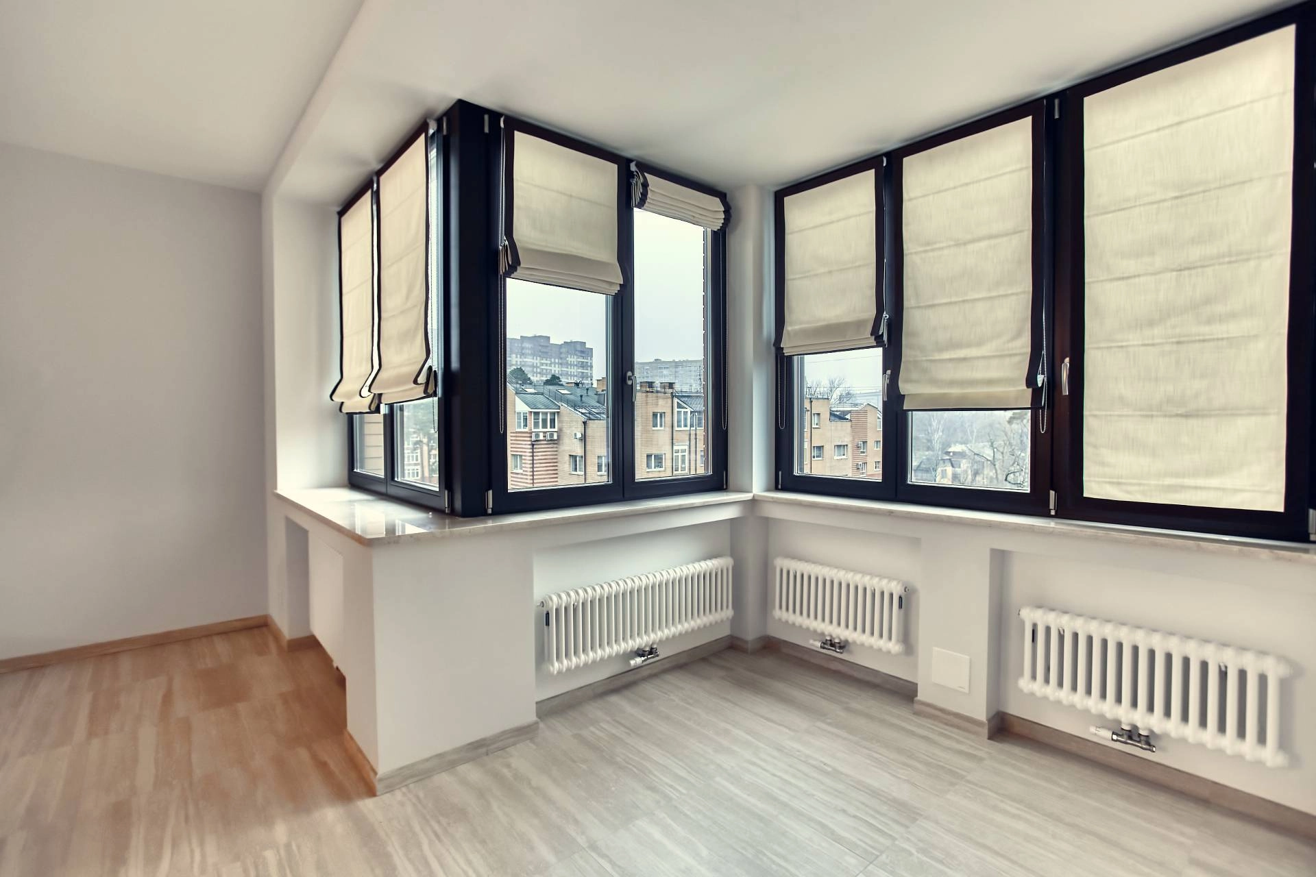 Roman shades on a full set of windows, including a corner window near Sacramento, California (CA)