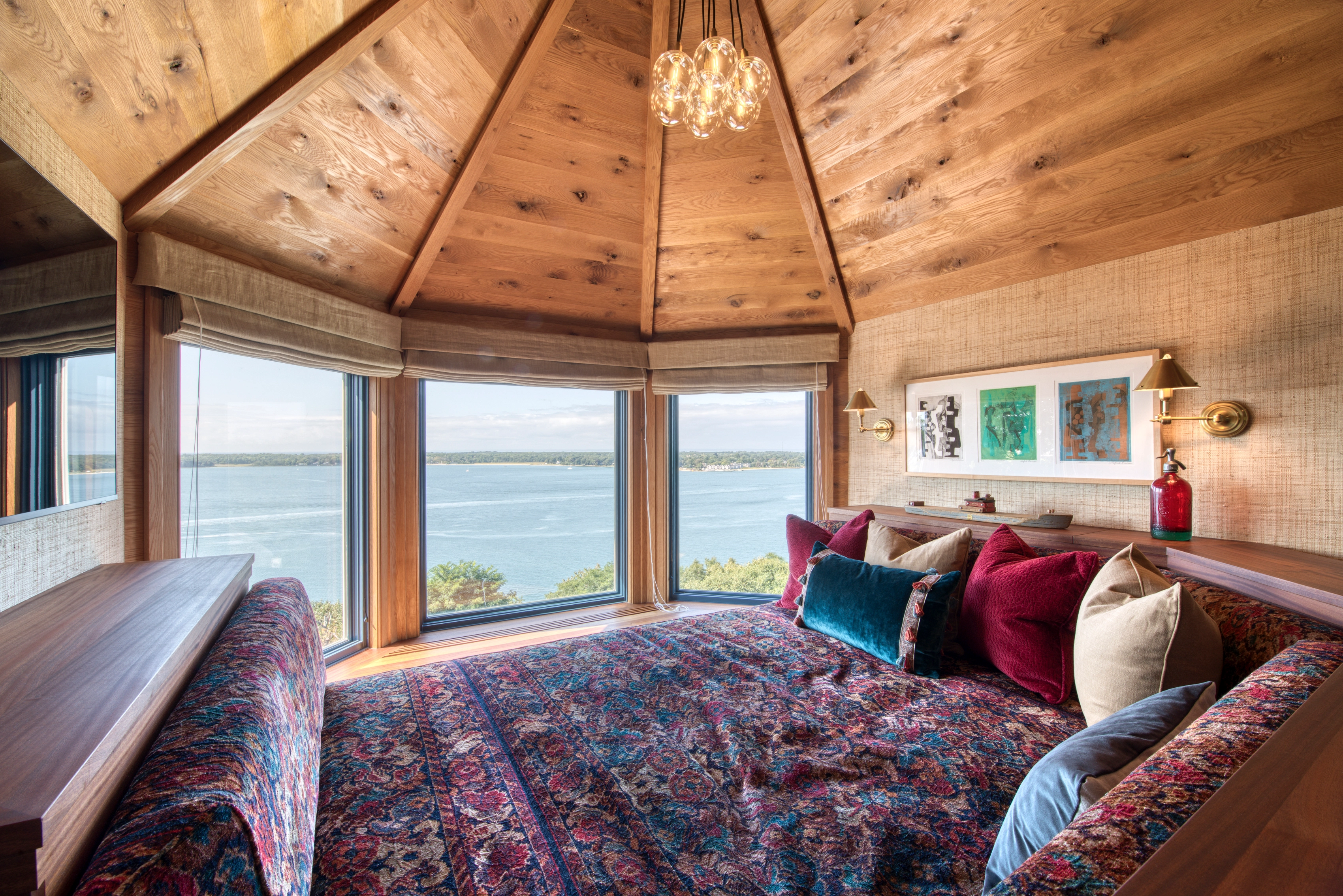 Bedroom windows with Hunter Douglas shades.