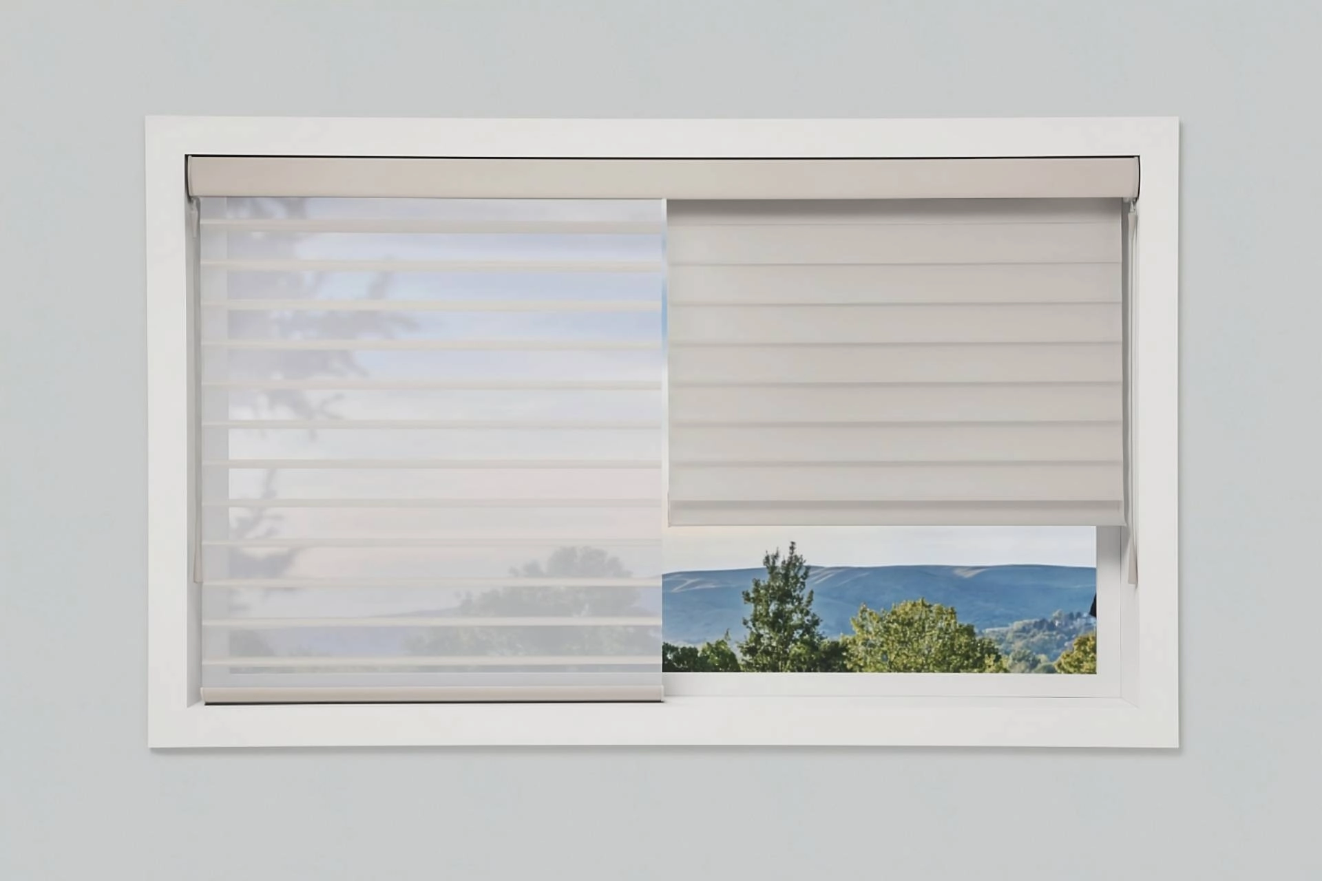 Up-close image of Hunter Douglas sheer shades comparing two different fabric opacities on one window