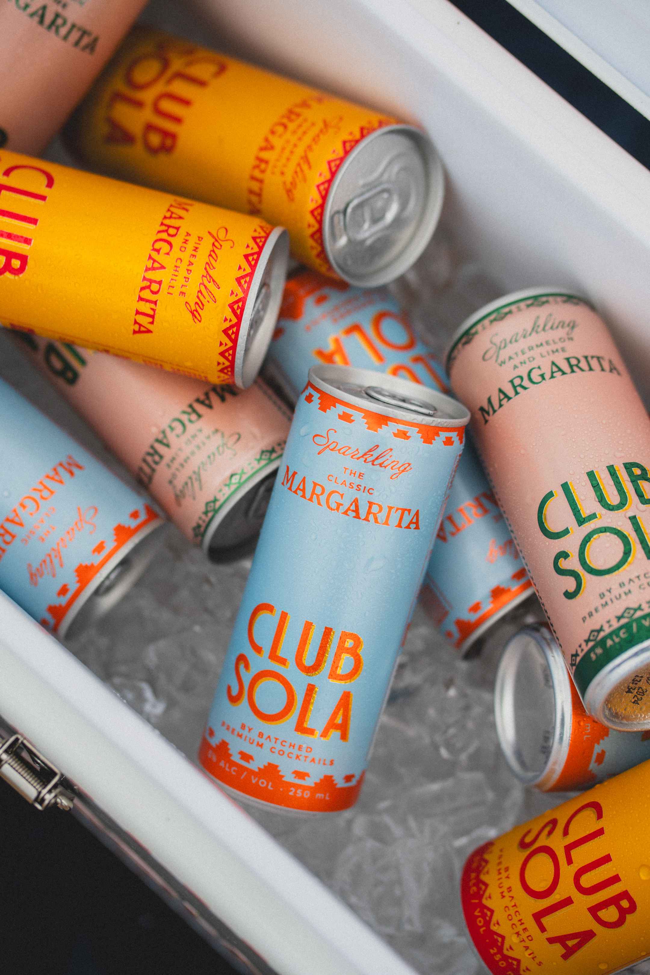 Cans of Club Sola in ice