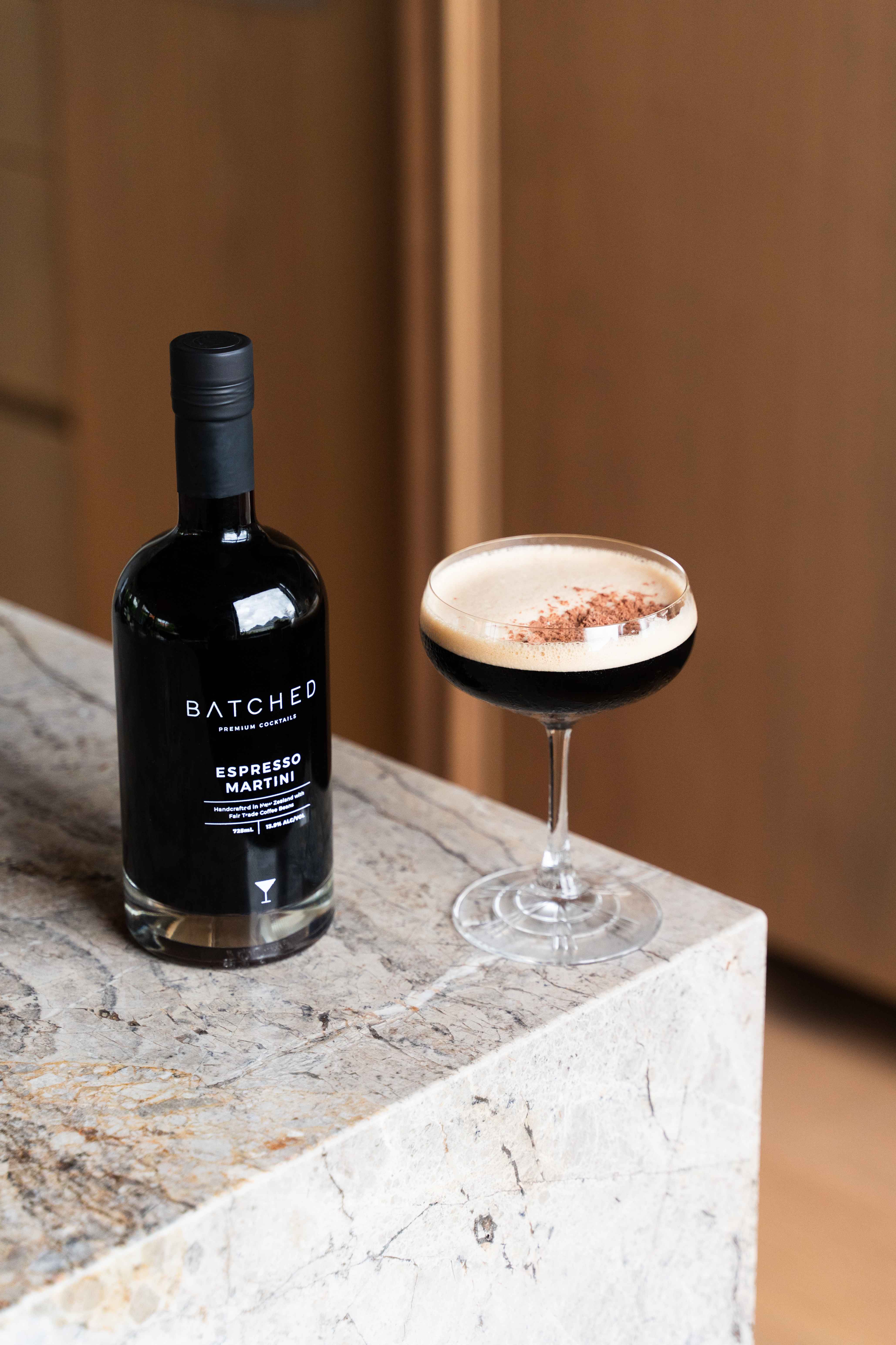 Batched Espresso Martini bottle and glass on bench top