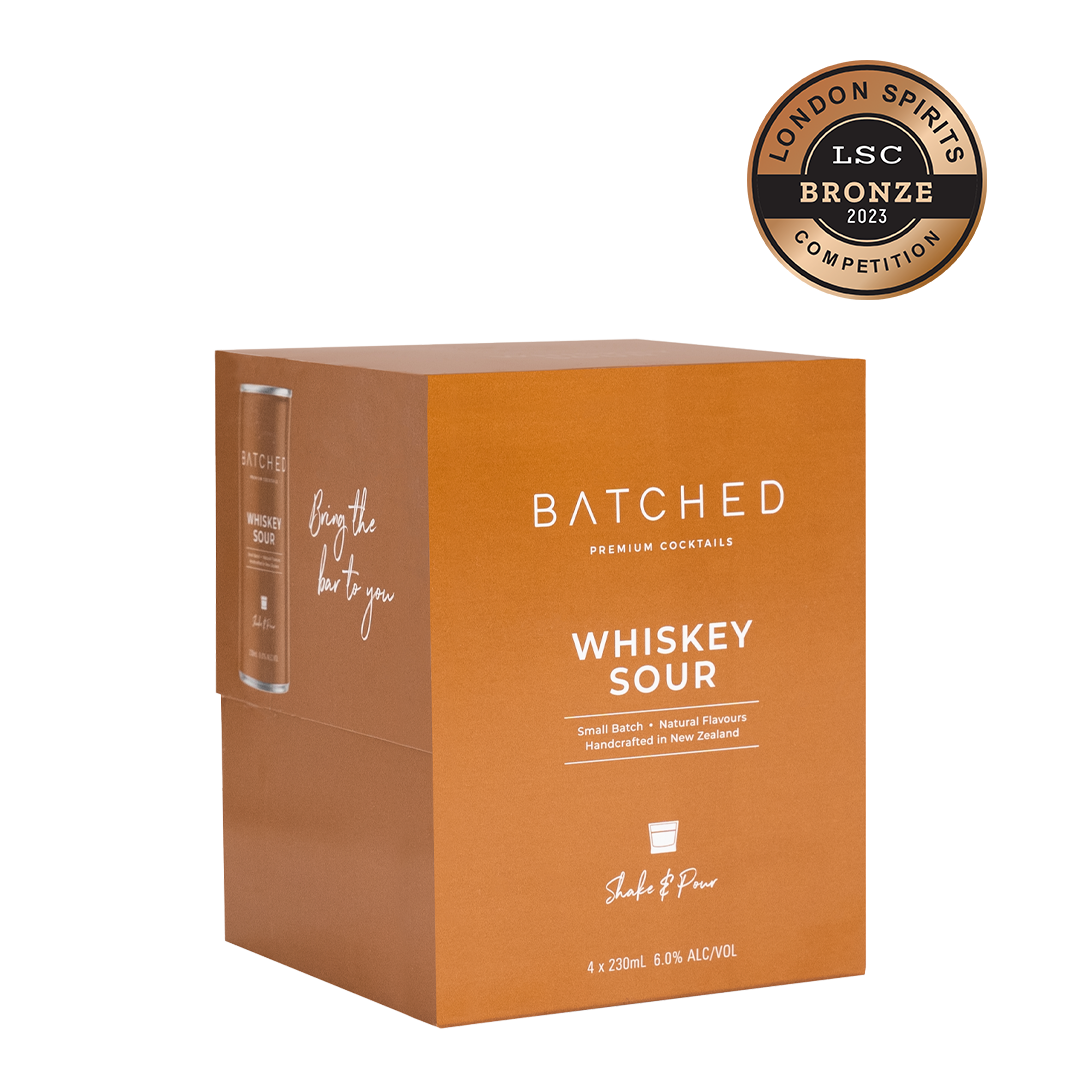 Box of Batched Whiskey Sour cans with bronze medal