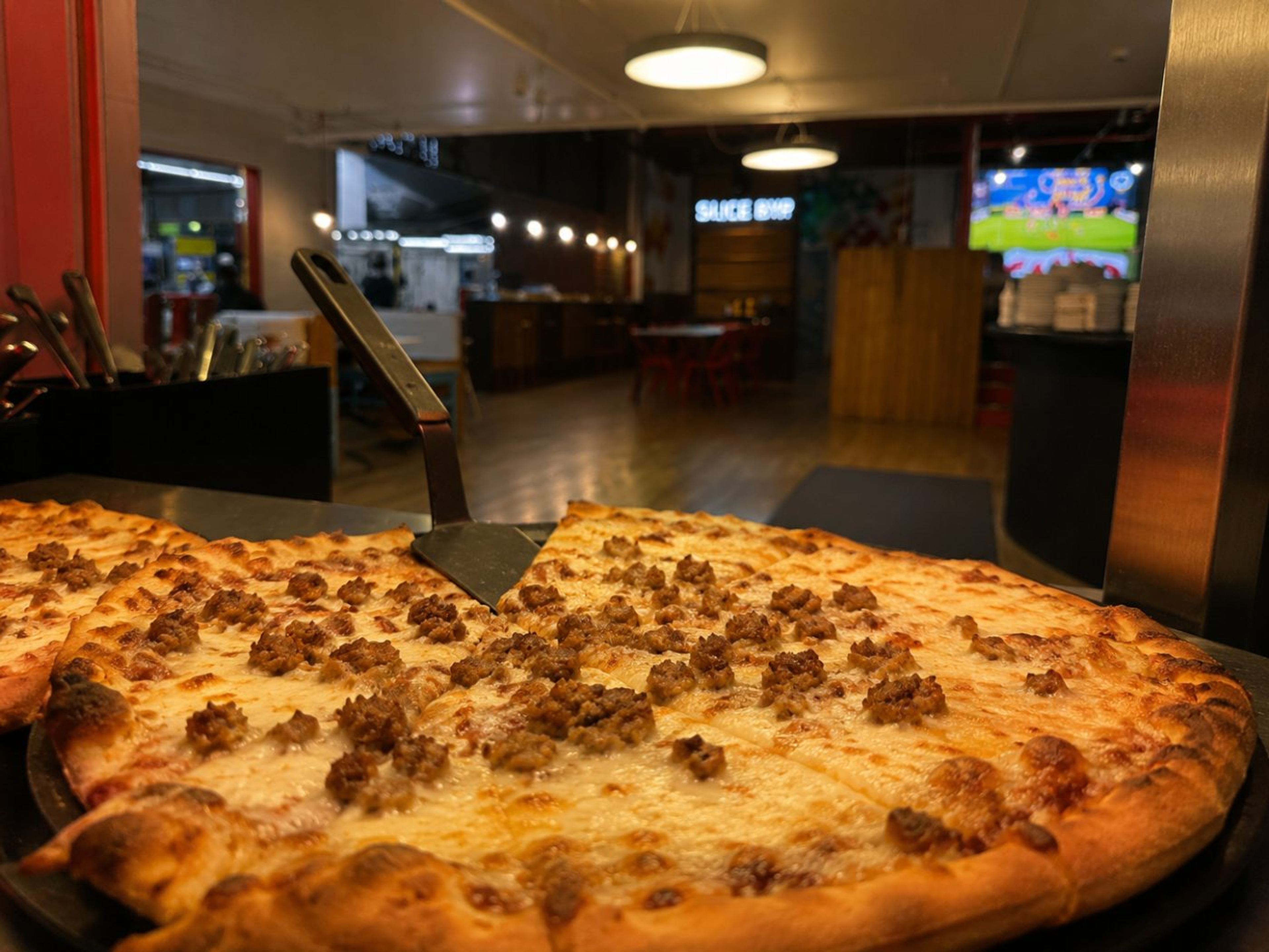 A whole sausage pizza