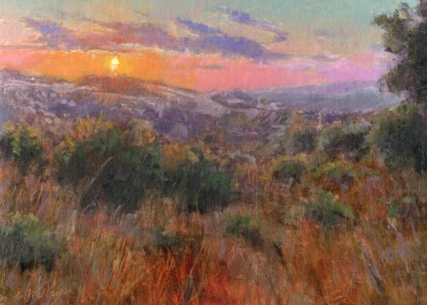 plein air painting of vivid orange sunset over a rocky hilly landscape