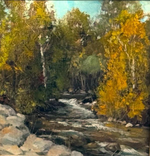 plein air painting of mountain creek with golden cottonwood trees in fall