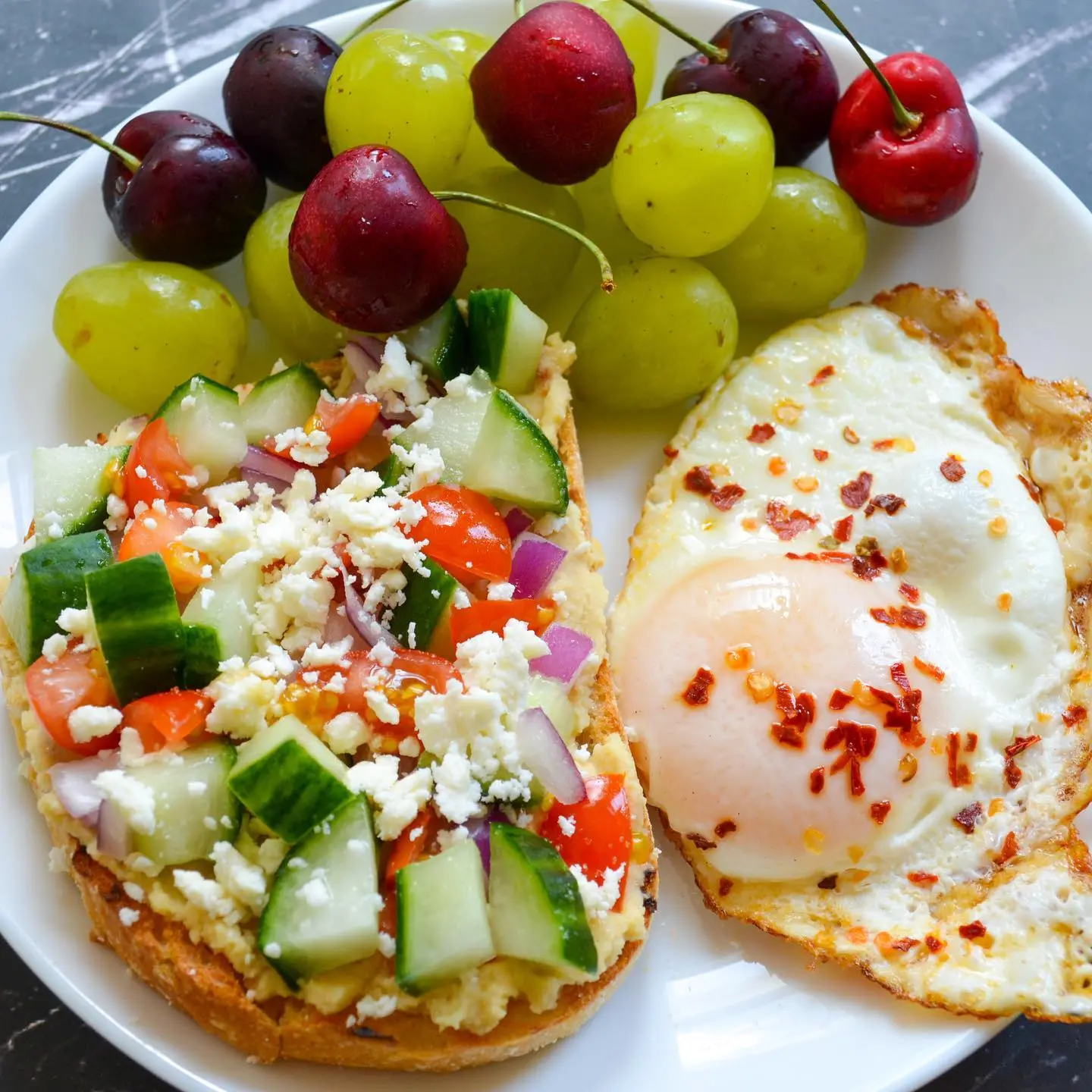 Hummus Toast with Greek Salad & Egg
