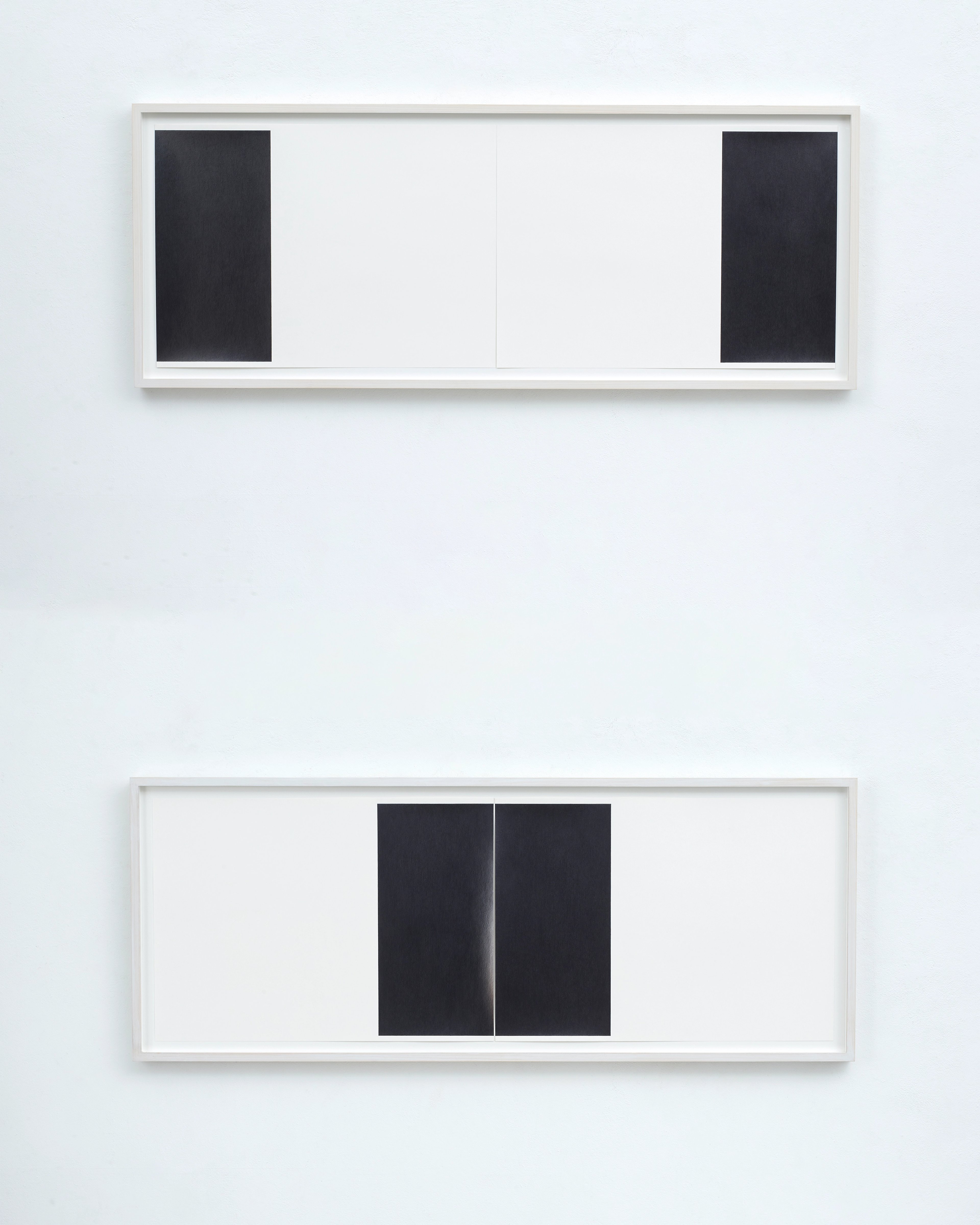 Two framed minimalist compositions: upper frame with two dark rectangles flanking white space; lower frame with two dark rectangles centered on white ground