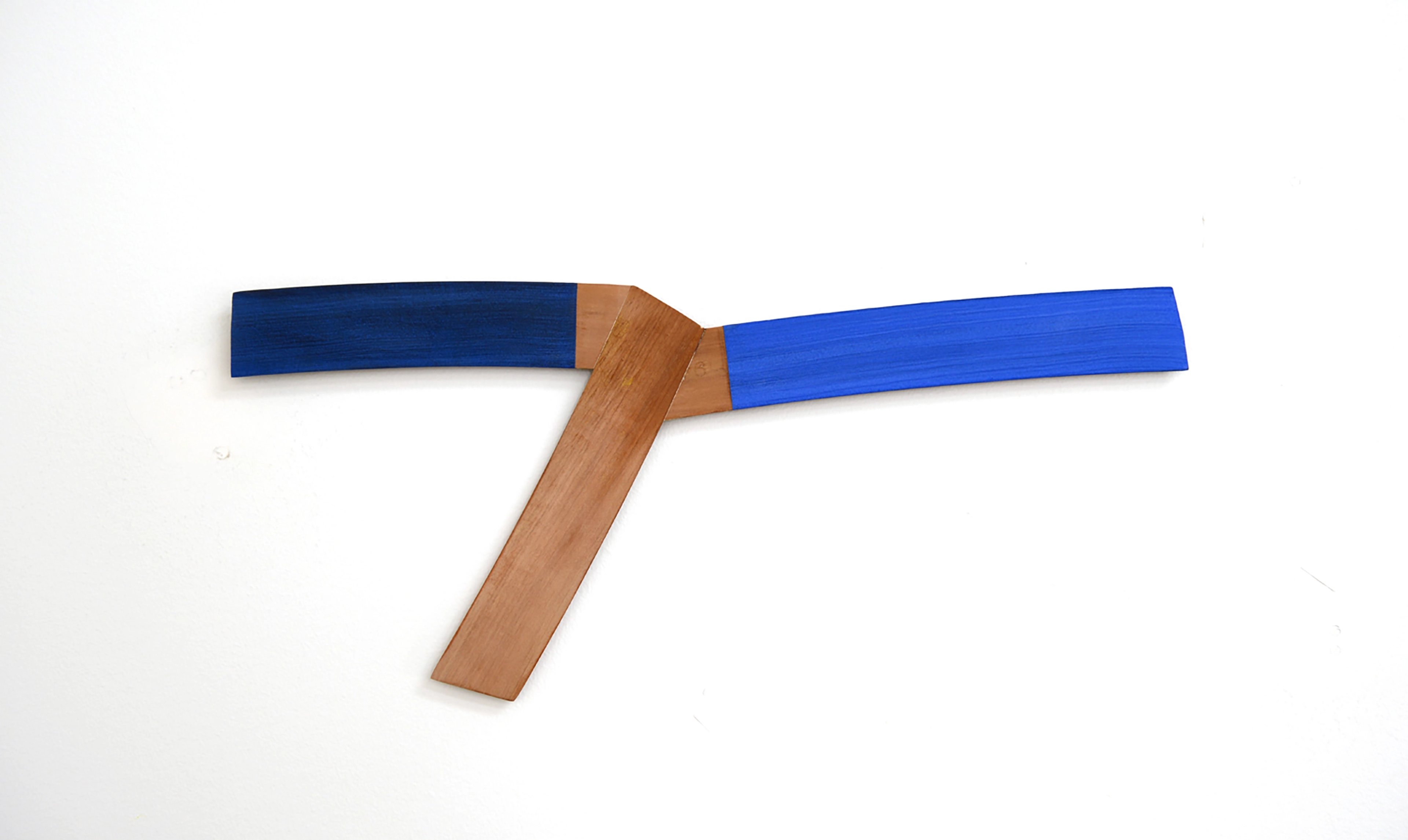 Wooden T-shaped form with a natural tan vertical beam and two blue painted horizontal arms extending left and right against a white background.