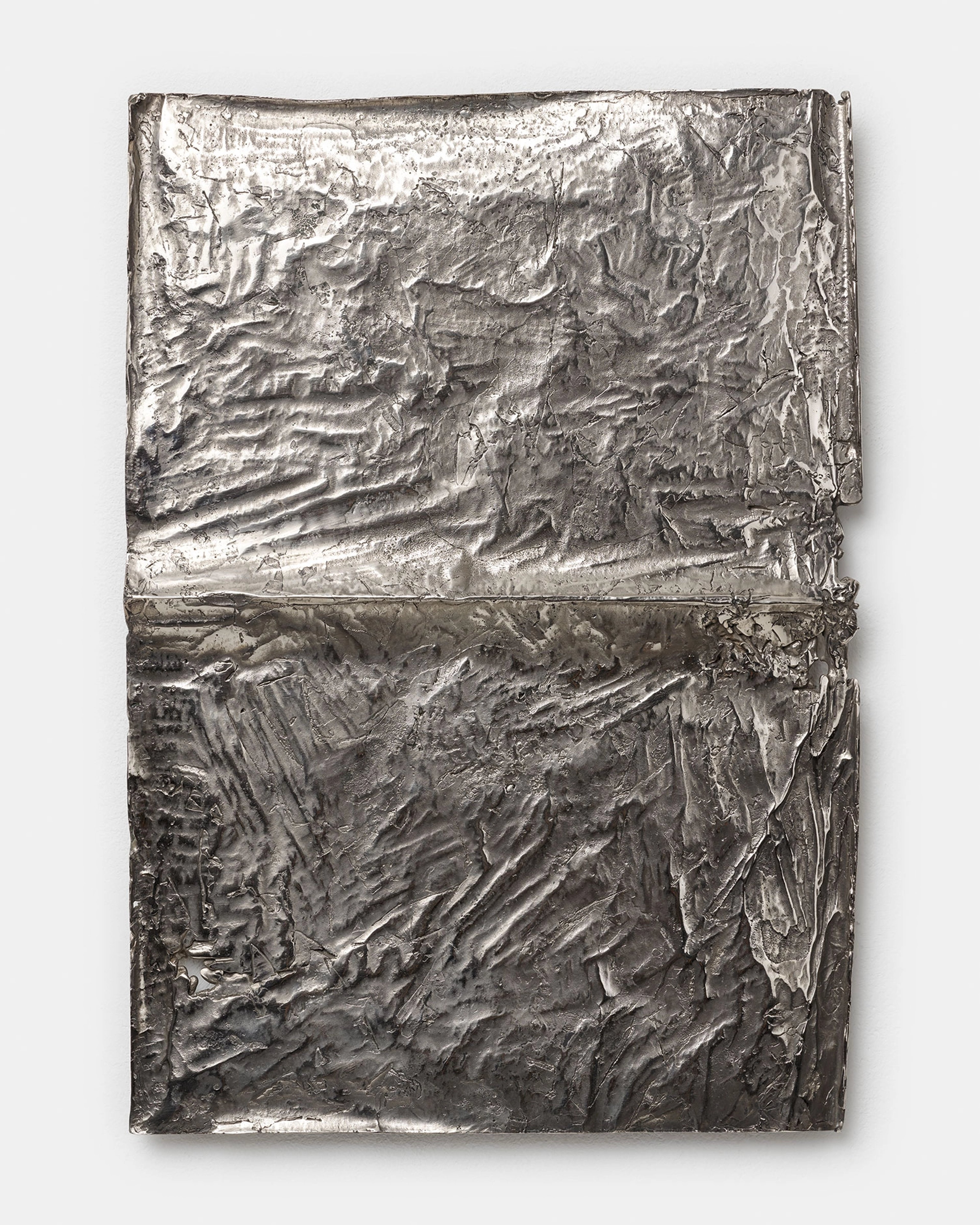 Two stacked rectangular panels of heavily textured nickel silver with deeply embossed, gestural marks and ridges creating an abstract, weathered surface.