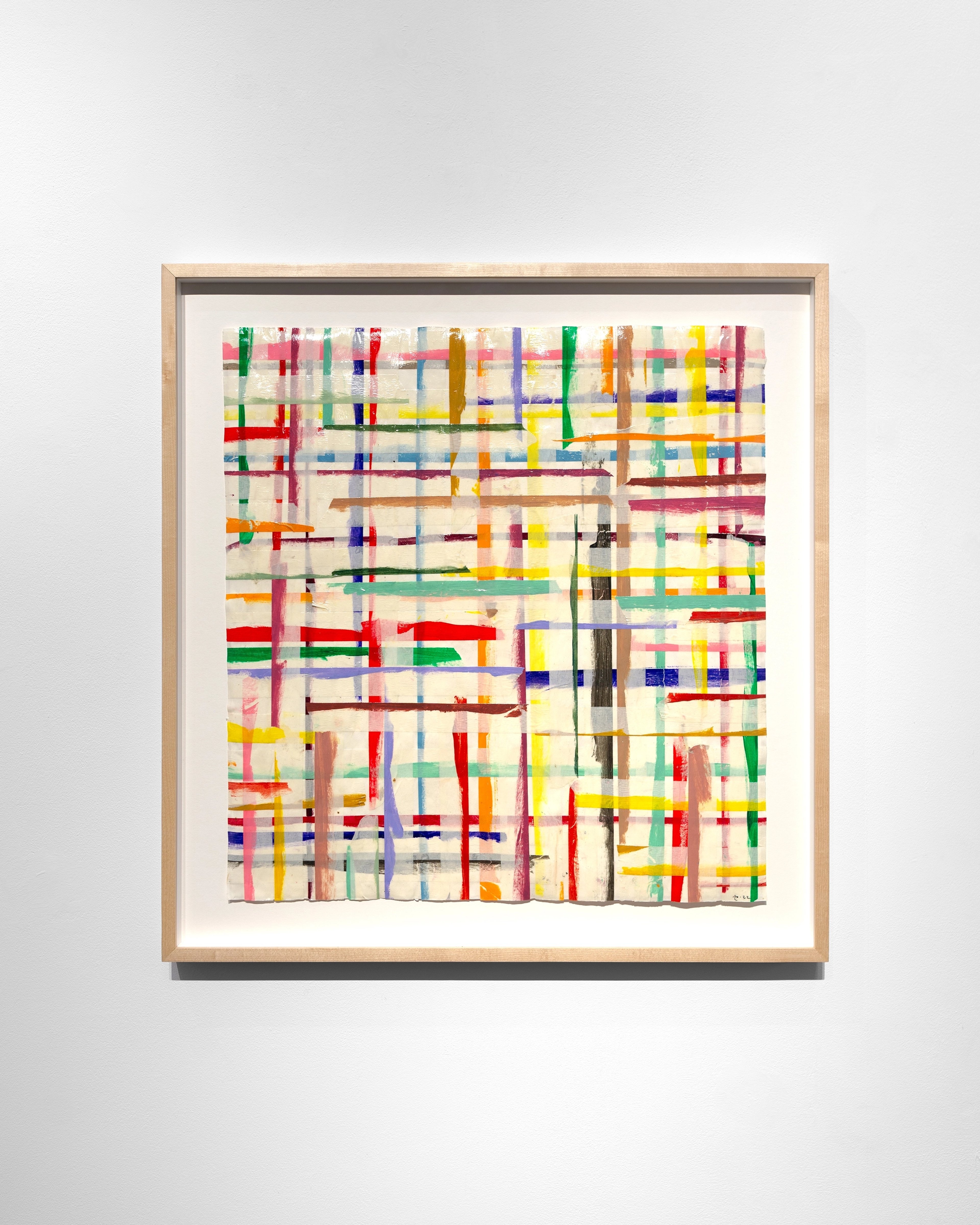 Vibrant abstract composition with intersecting horizontal and vertical strips of colored tape—red, yellow, blue, green, pink—creating a dense grid pattern on…