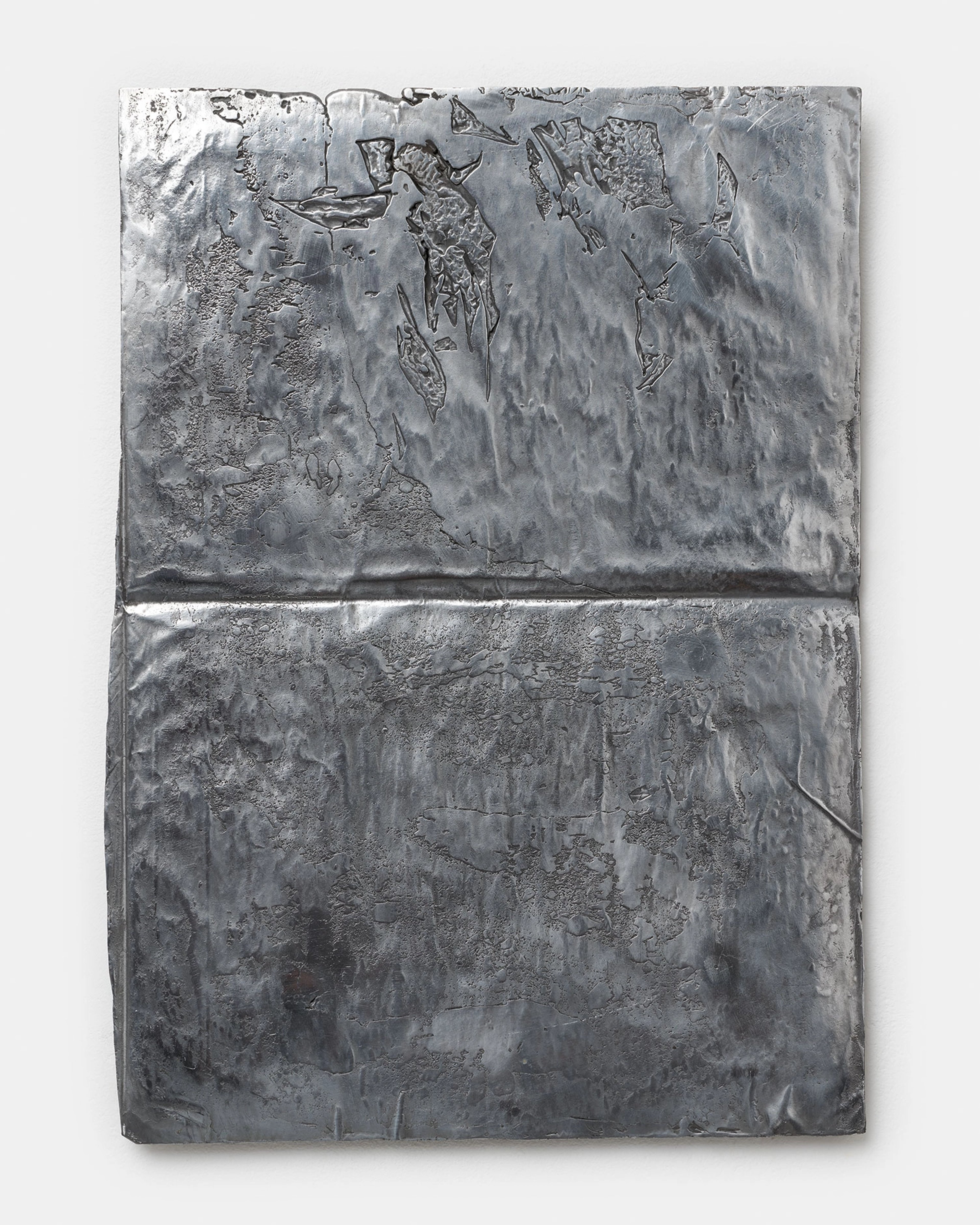 Textured aluminium panel divided horizontally, with embossed figural forms and gestural marks creating a weathered, industrial surface in shades of grey and…
