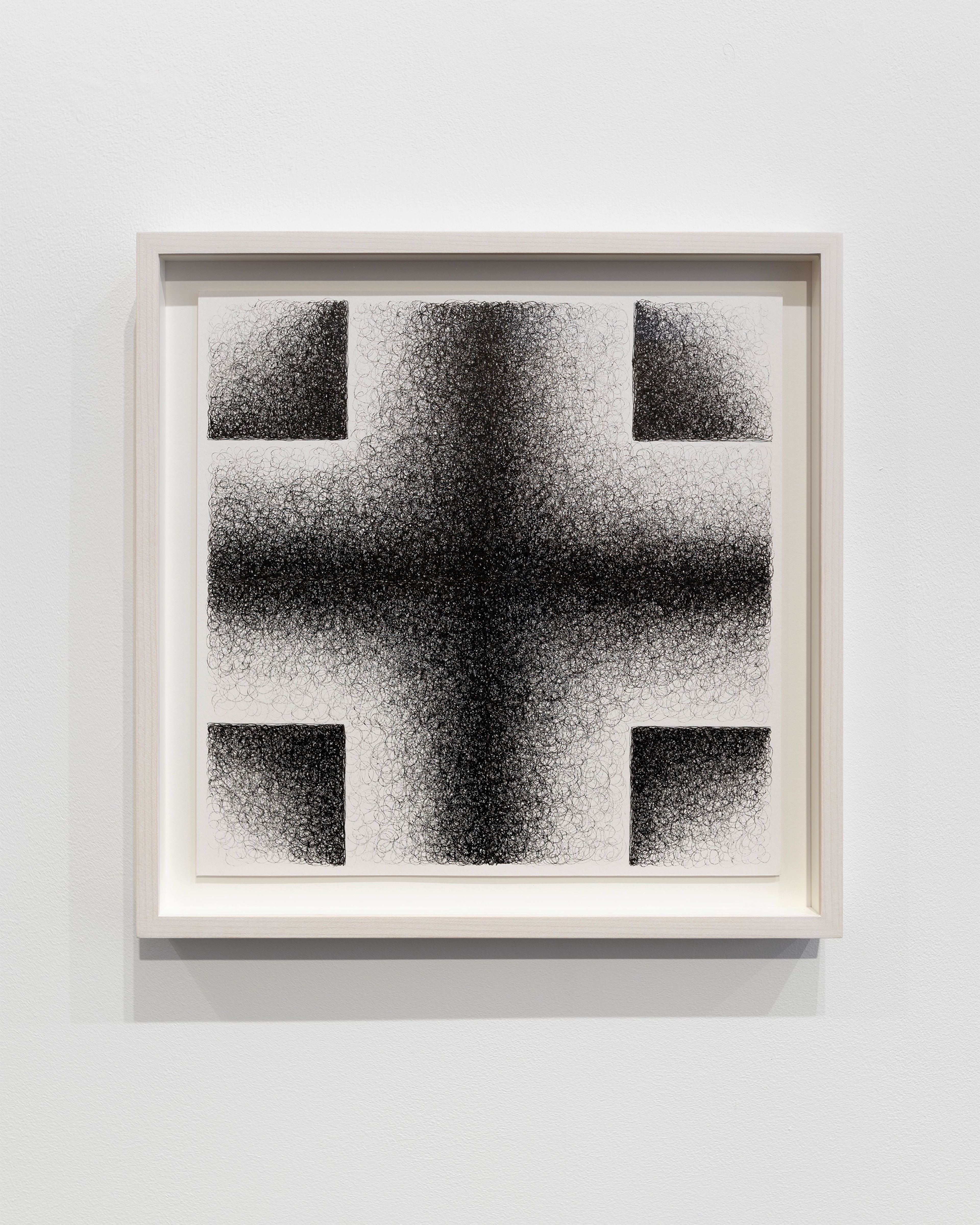 Black stippled cross and corner forms radiating from center on white paper, creating a symmetrical geometric composition through dense dotted marks