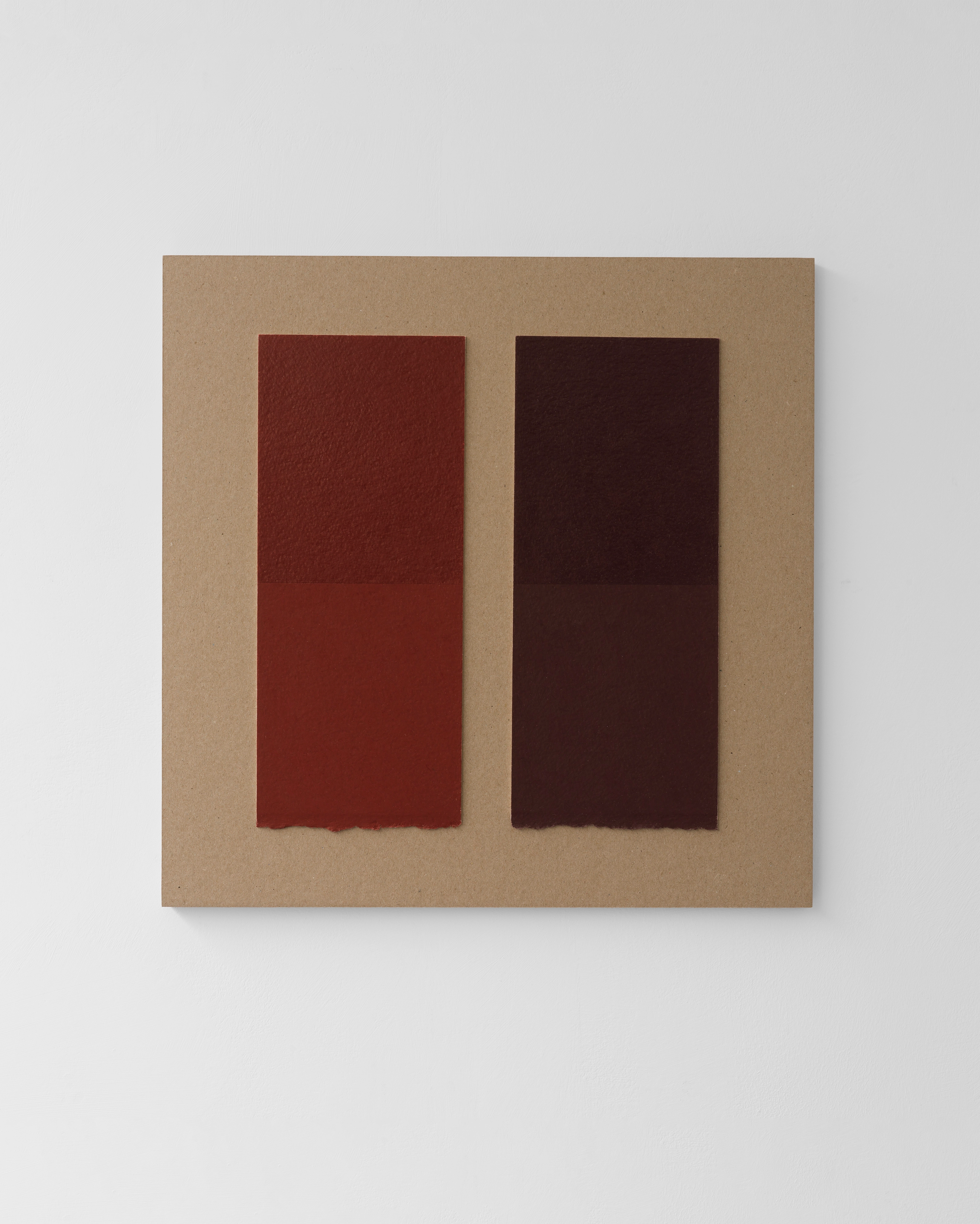 Two vertical rectangles in deep red and dark brown tones on a tan card panel, rendered in wax pencil with subtle texture and variation.