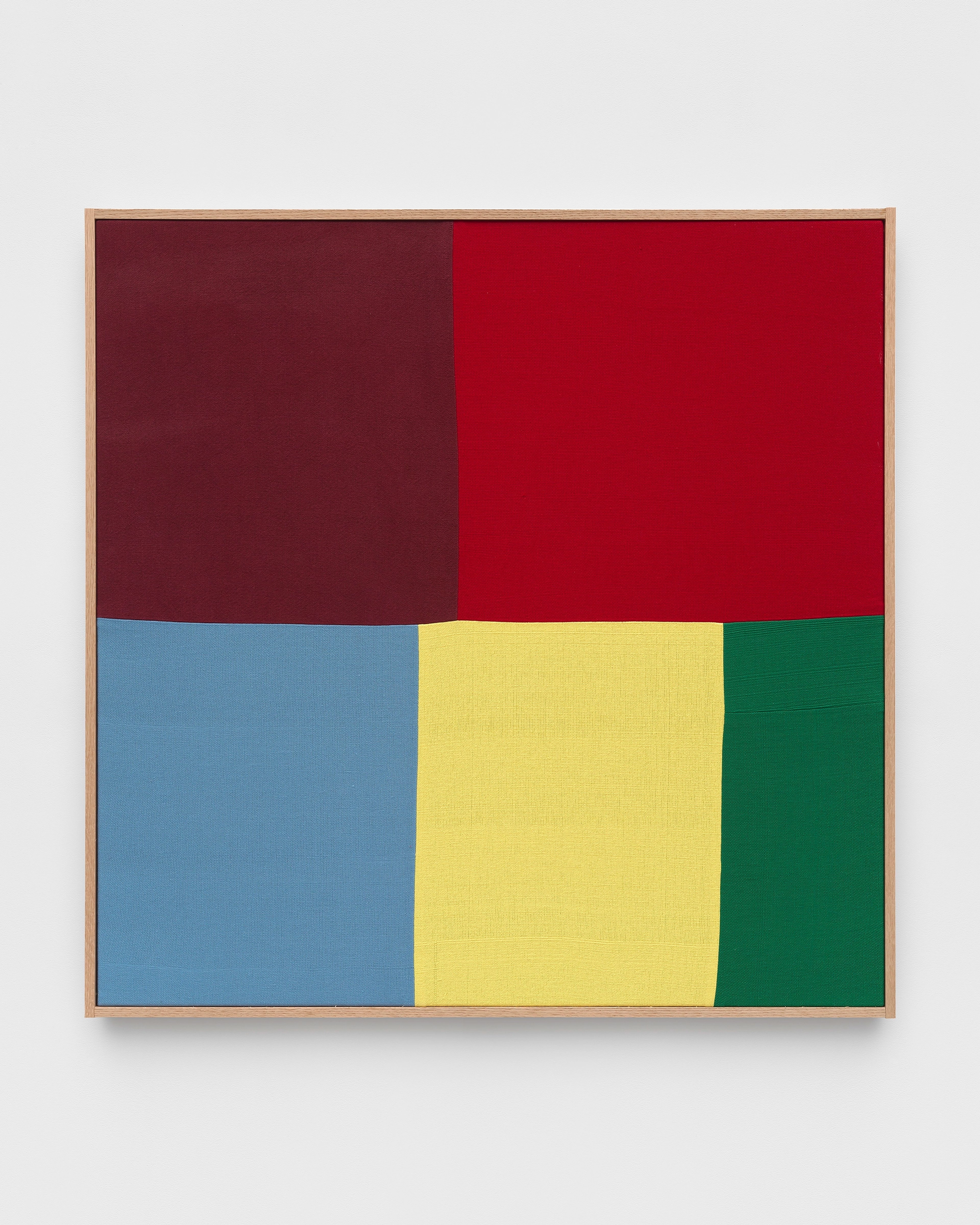 Hand-woven cotton and linen canvas divided into six color-blocked sections: deep maroon and bright red in upper half, pale blue, bright yellow, and forest gr…