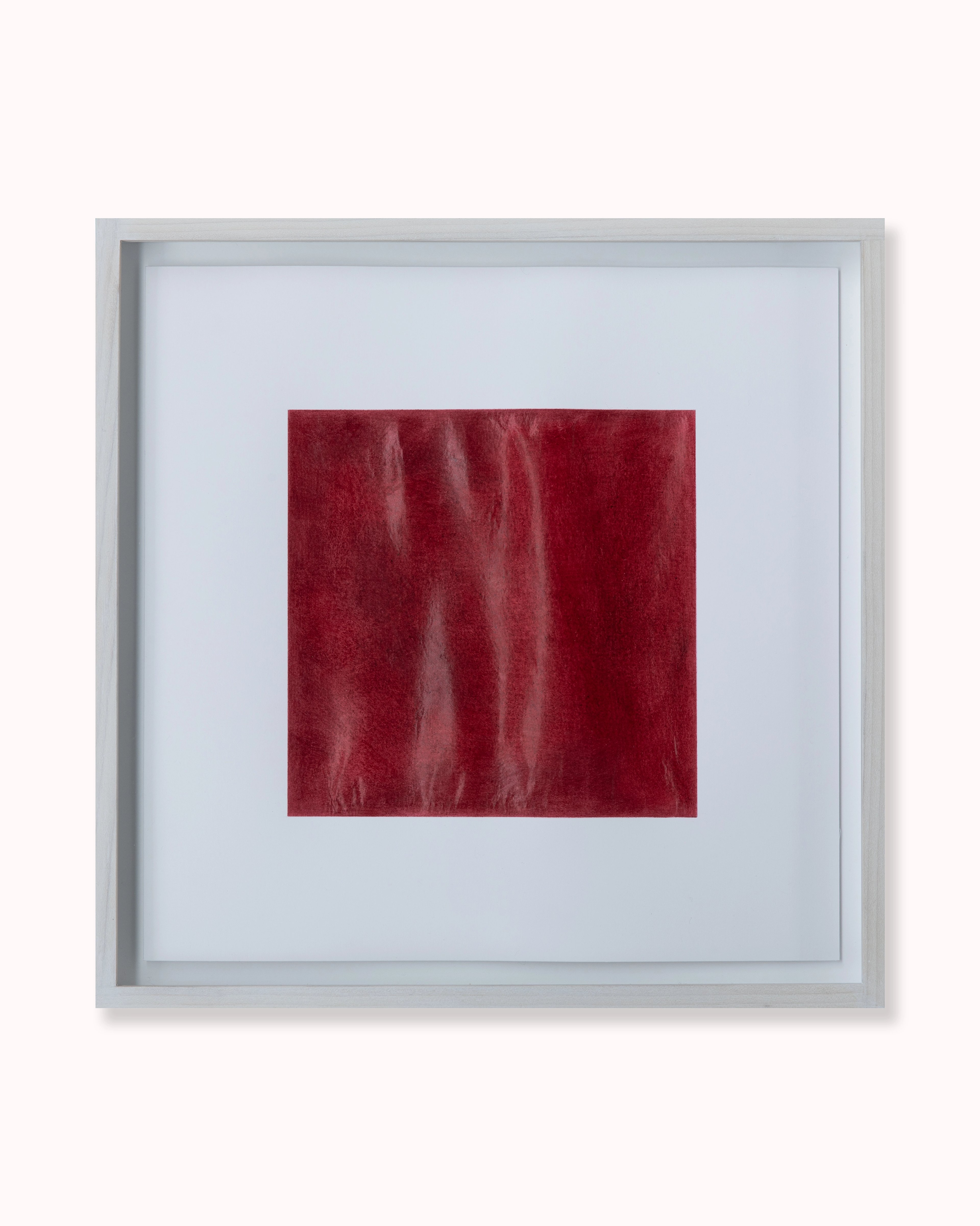 Deep red rectangular form drawn in madder carmine pencil on white paper, mounted in a light grey frame with wide mat board