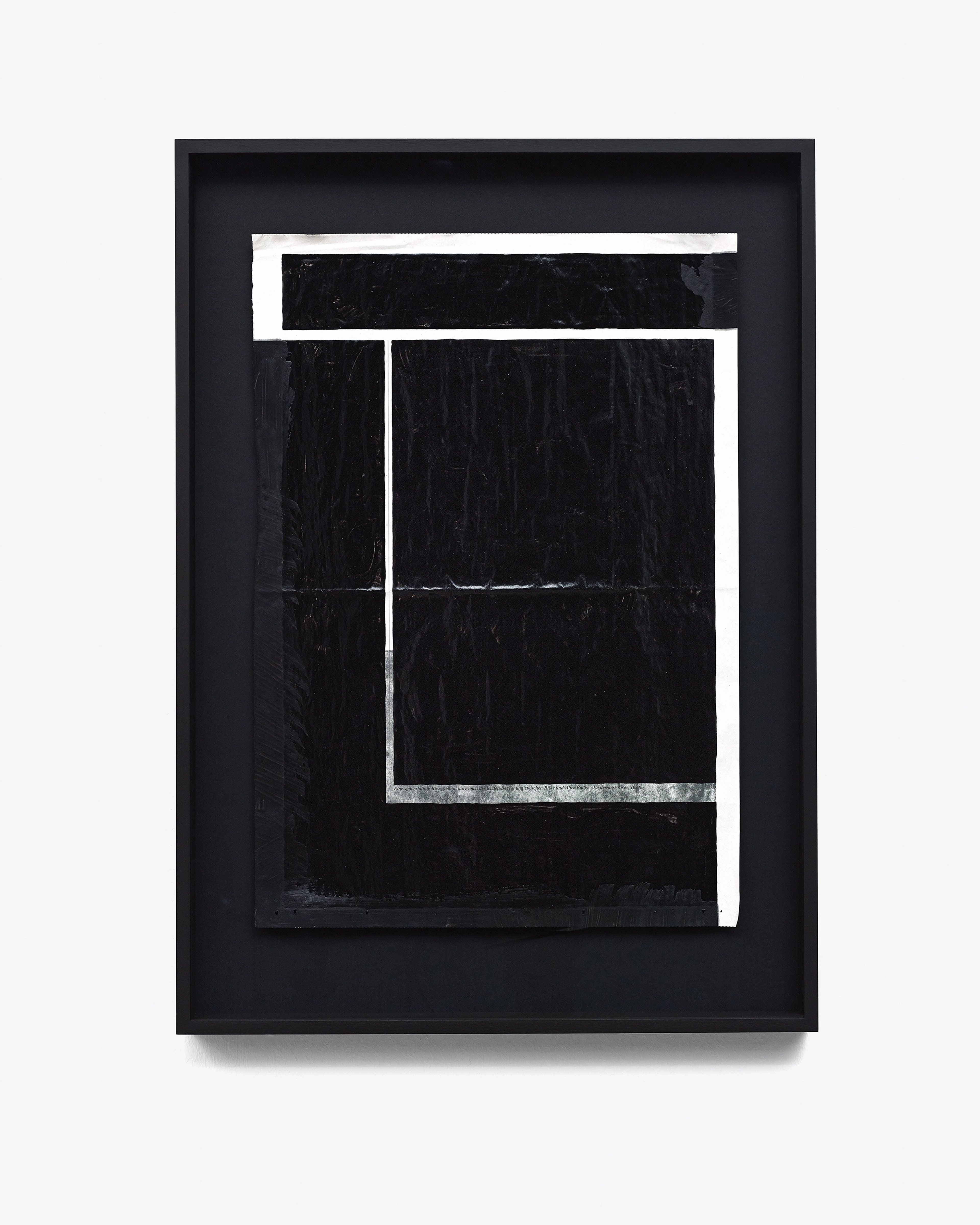 Black lacquer paint applied to newspaper in geometric rectangular forms with white negative space, creating an abstract composition within a black framed box