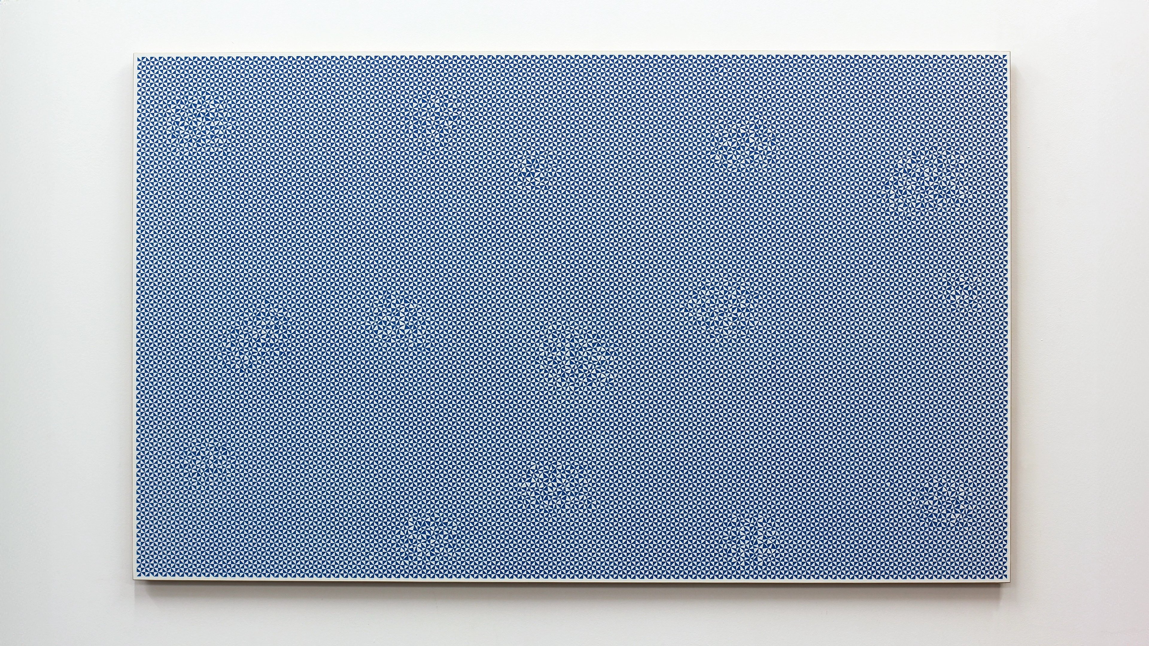 Blue acrylic painted board with laser-engraved white geometric grid pattern creating subtle disrupted texture across horizontal rectangular surface