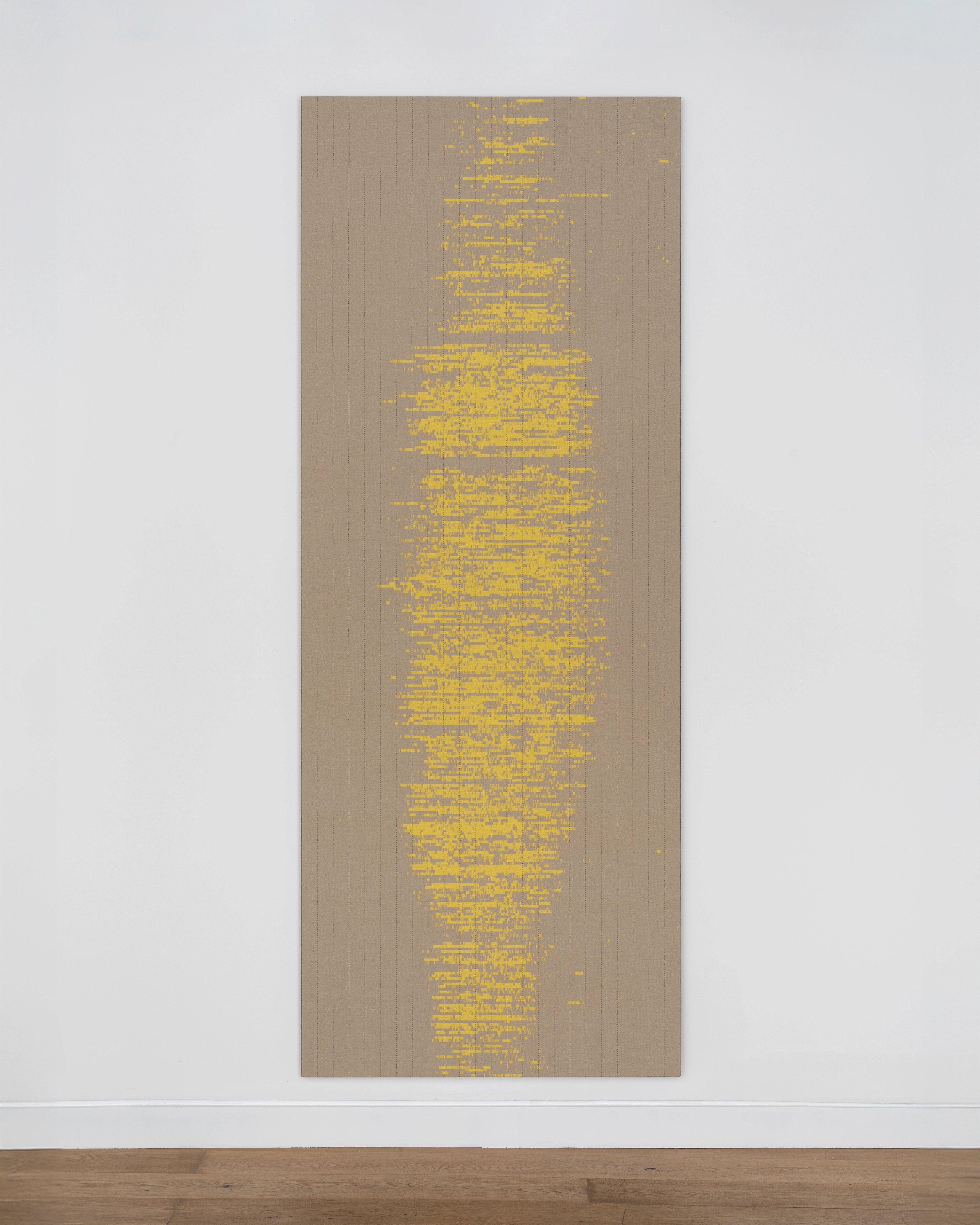 Tall jacquard tapestry in taupe with dense yellow text forming a vertical column down the centre, resembling a digitised or pixelated landscape