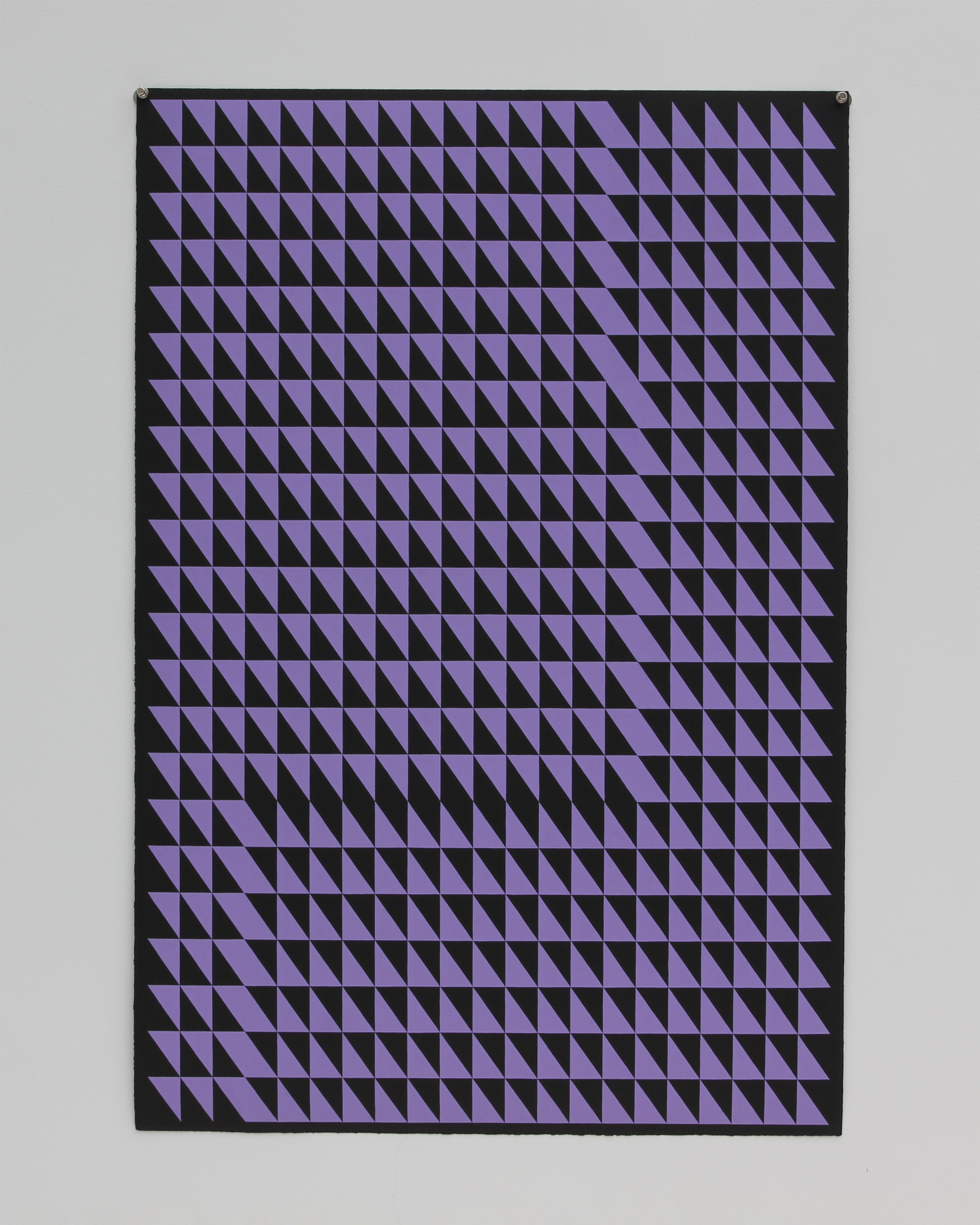 Geometric composition of repeated small triangles in lavender and black creating an optical pattern with subtle diagonal distortions across the dark paper su…