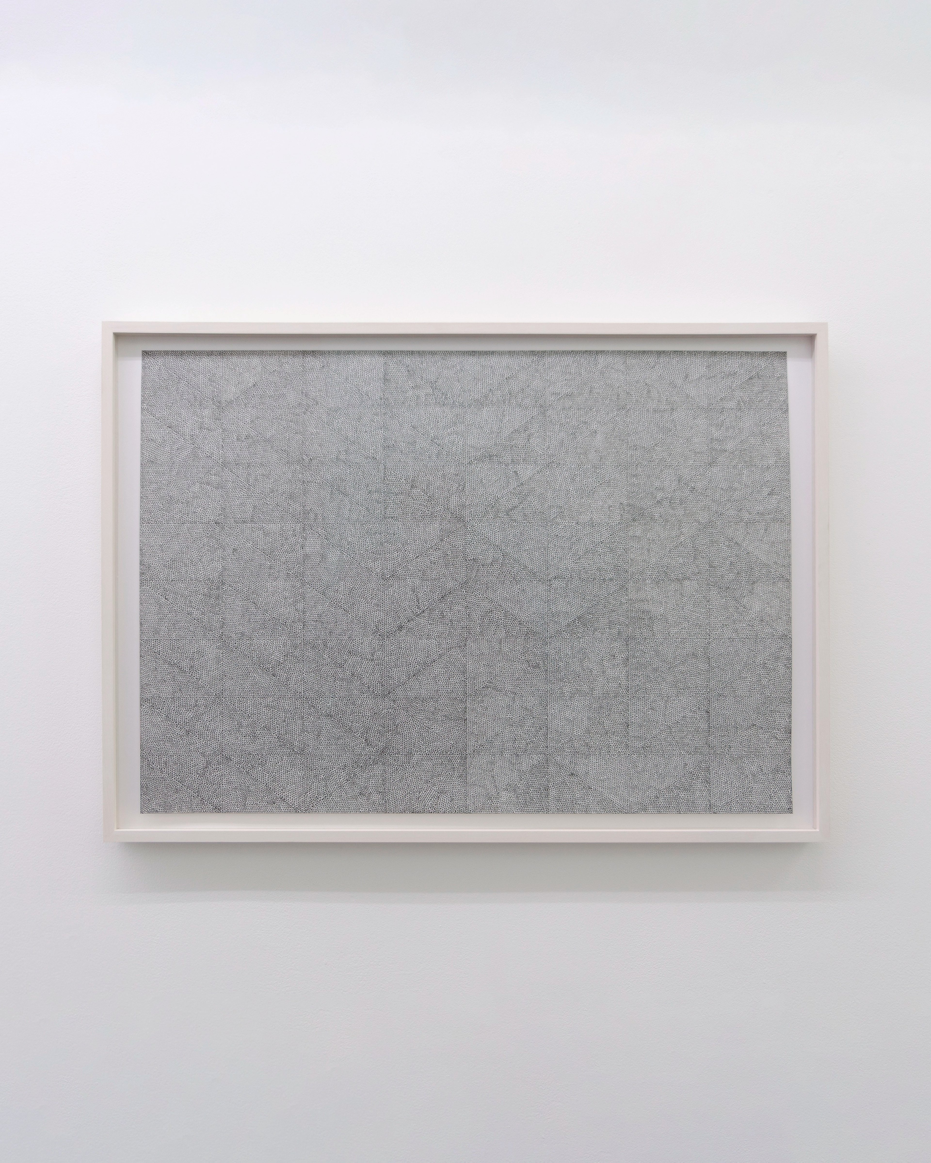 Dense linear marks in grey ink create an intricate woven or cross-hatched texture across white paper in a white frame