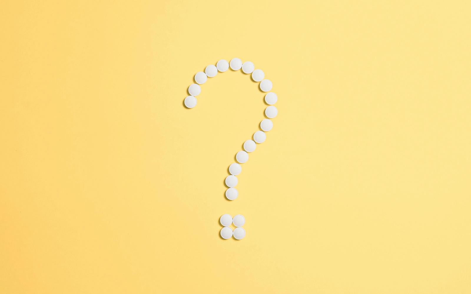 Question mark made from tablets