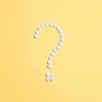 Question mark made from tablets