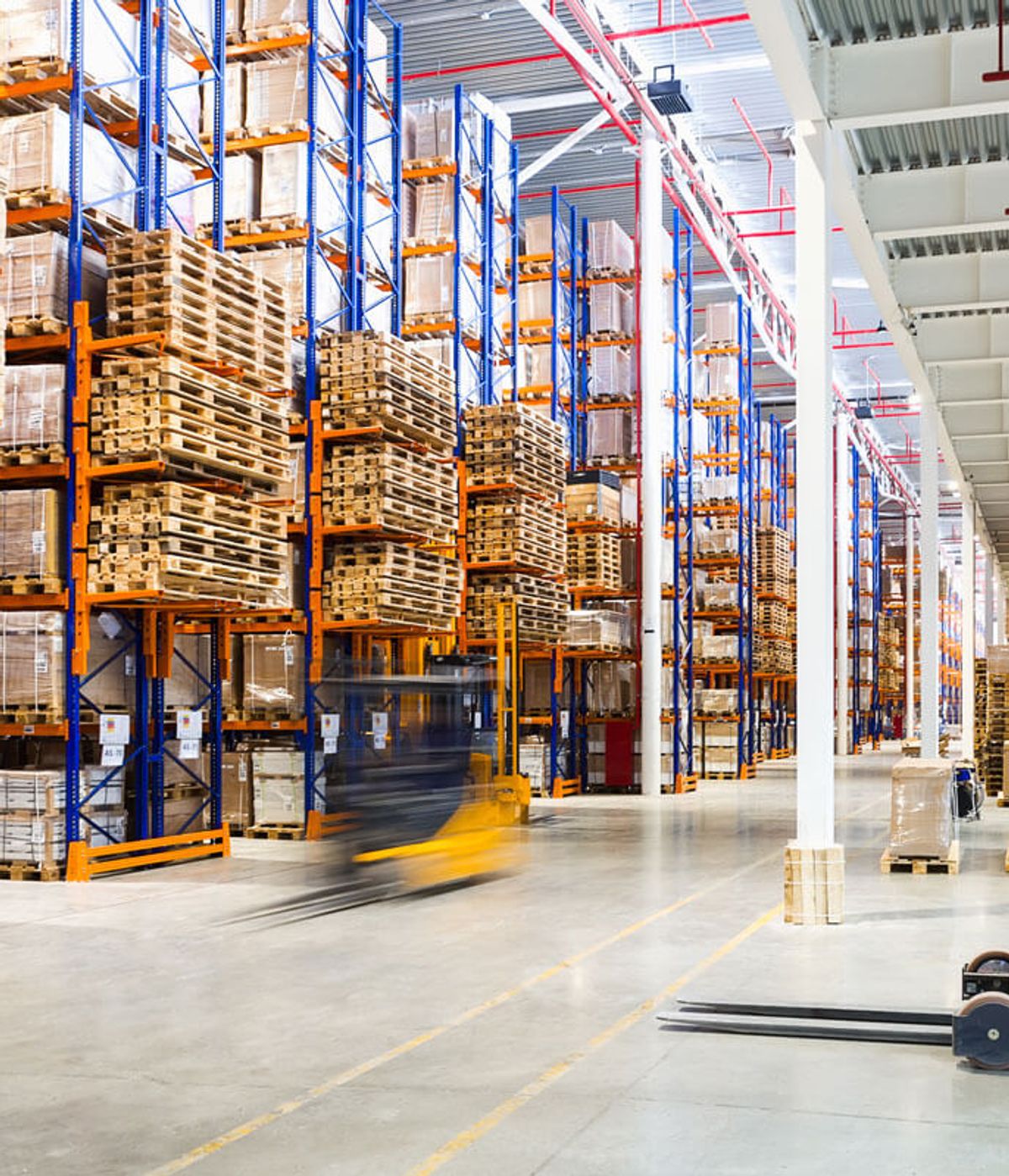 Warehouse with moving trucks