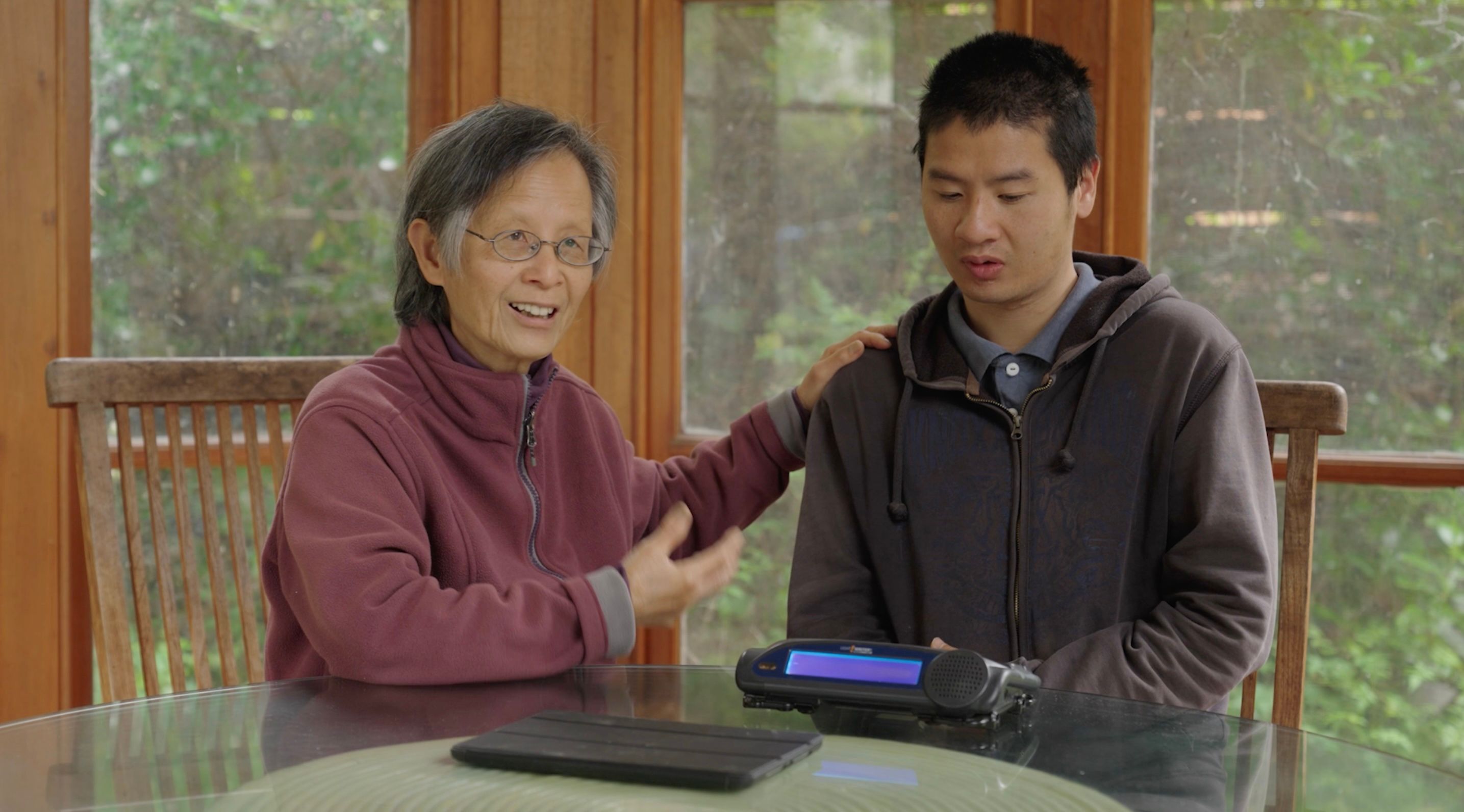 Sarah talking with Tim