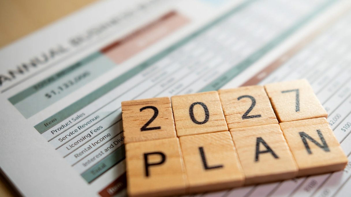 Tiles that spell out “2027 Plan”