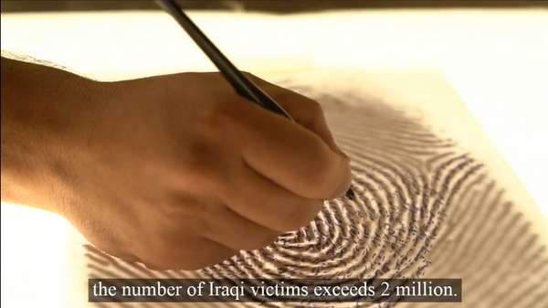 a hand holds a calligraphy pen, writing names in Arabic calligraphy on a large sepia-colored fingerprint on paper. A video caption at the bottom reads "the number of Iraqi victims exceeds 2 million."