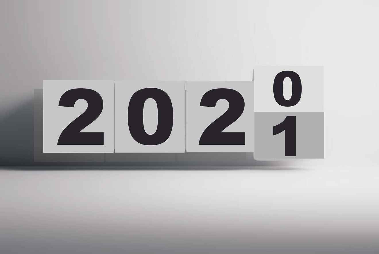 Photo of a calendar flipping over from 2020 to 2021