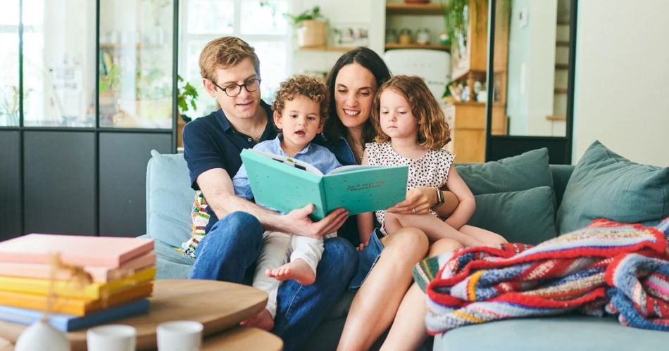 Cali's Books founder and CTO reading with their children