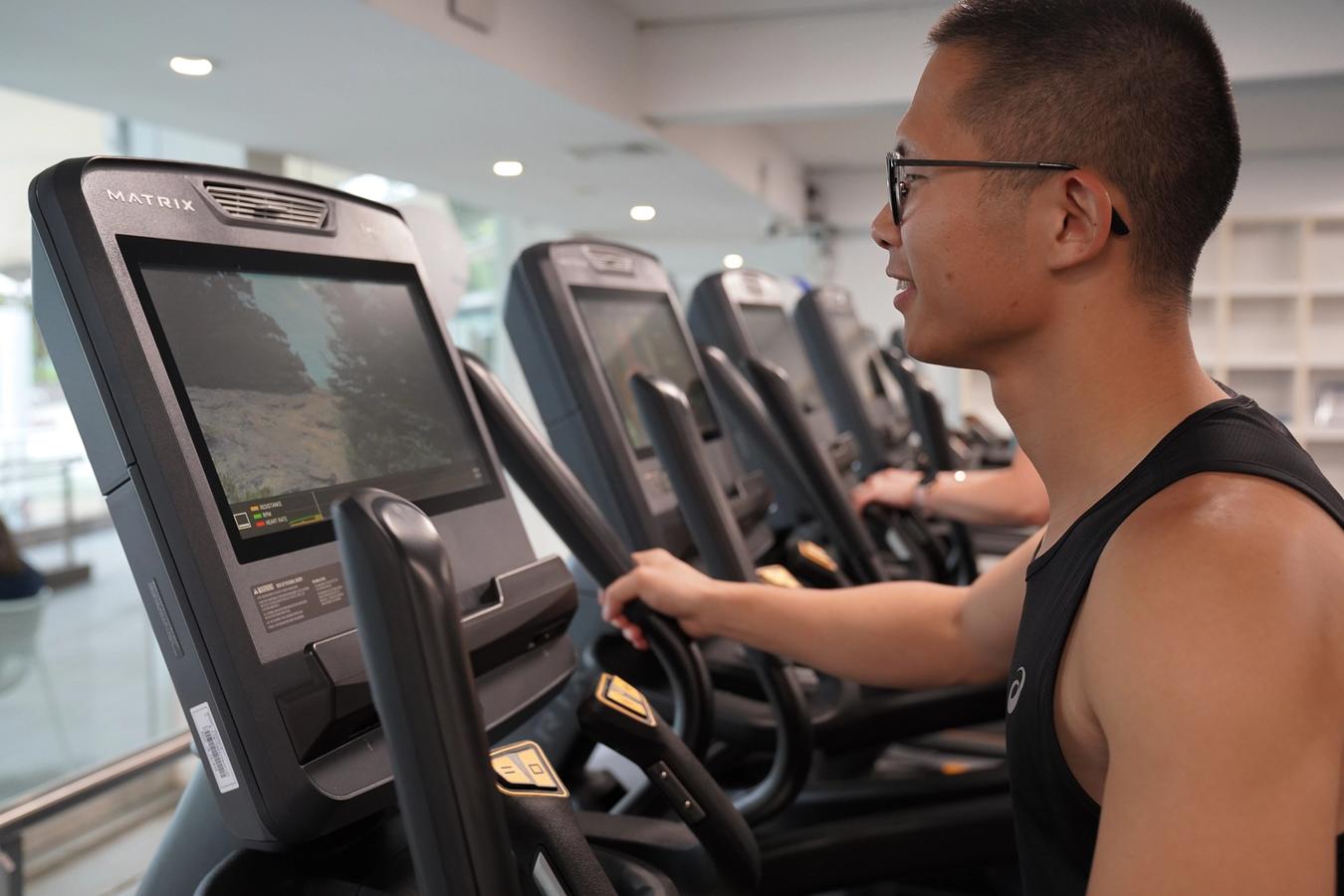 Customer using a treadmill at Victoria Park Pool fitness centre