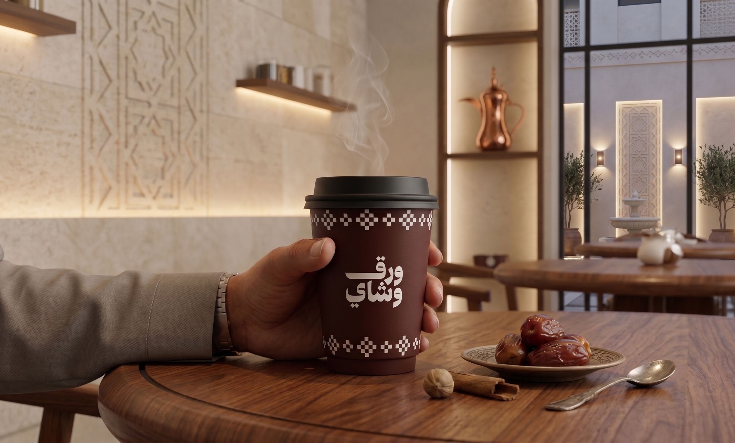 كوب الشاي الورقي وعليه شعار ورق وشاي